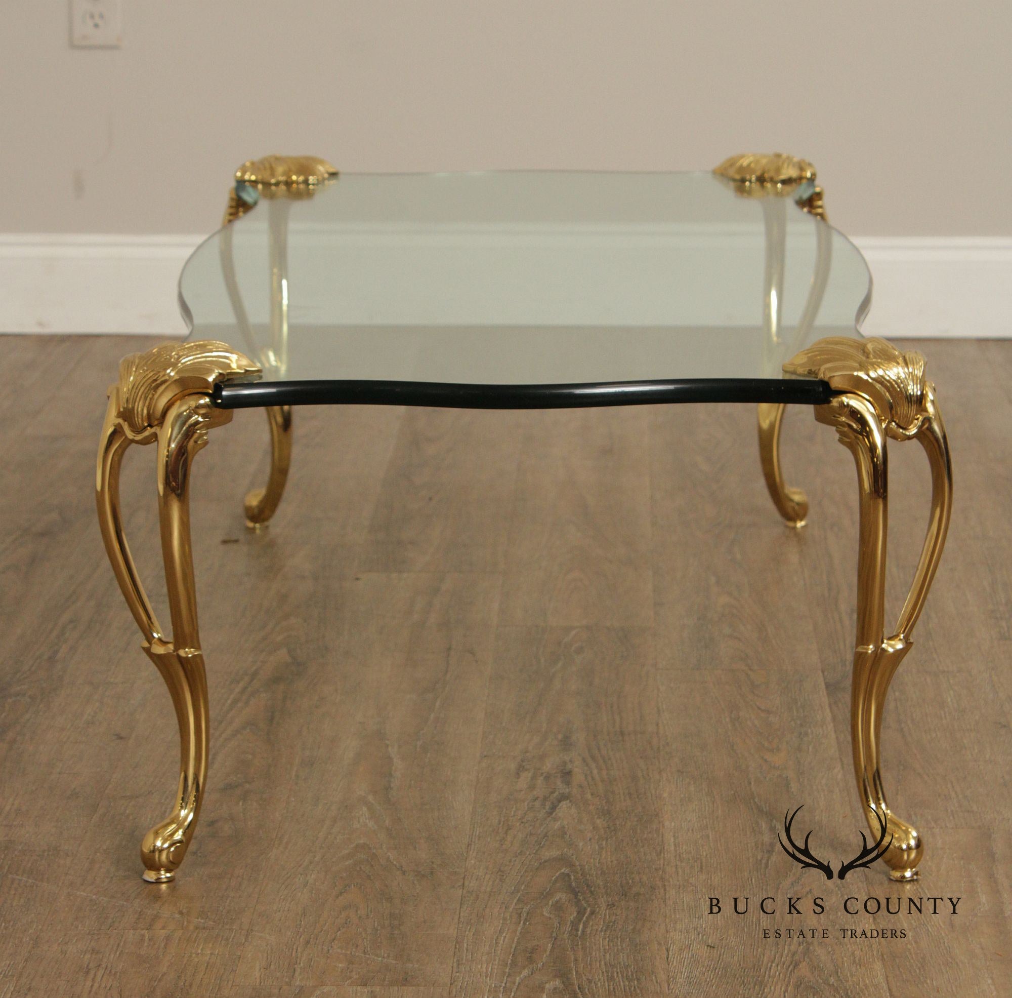French Style Glass Top Coffee Table With Sculpted Brass Legs
