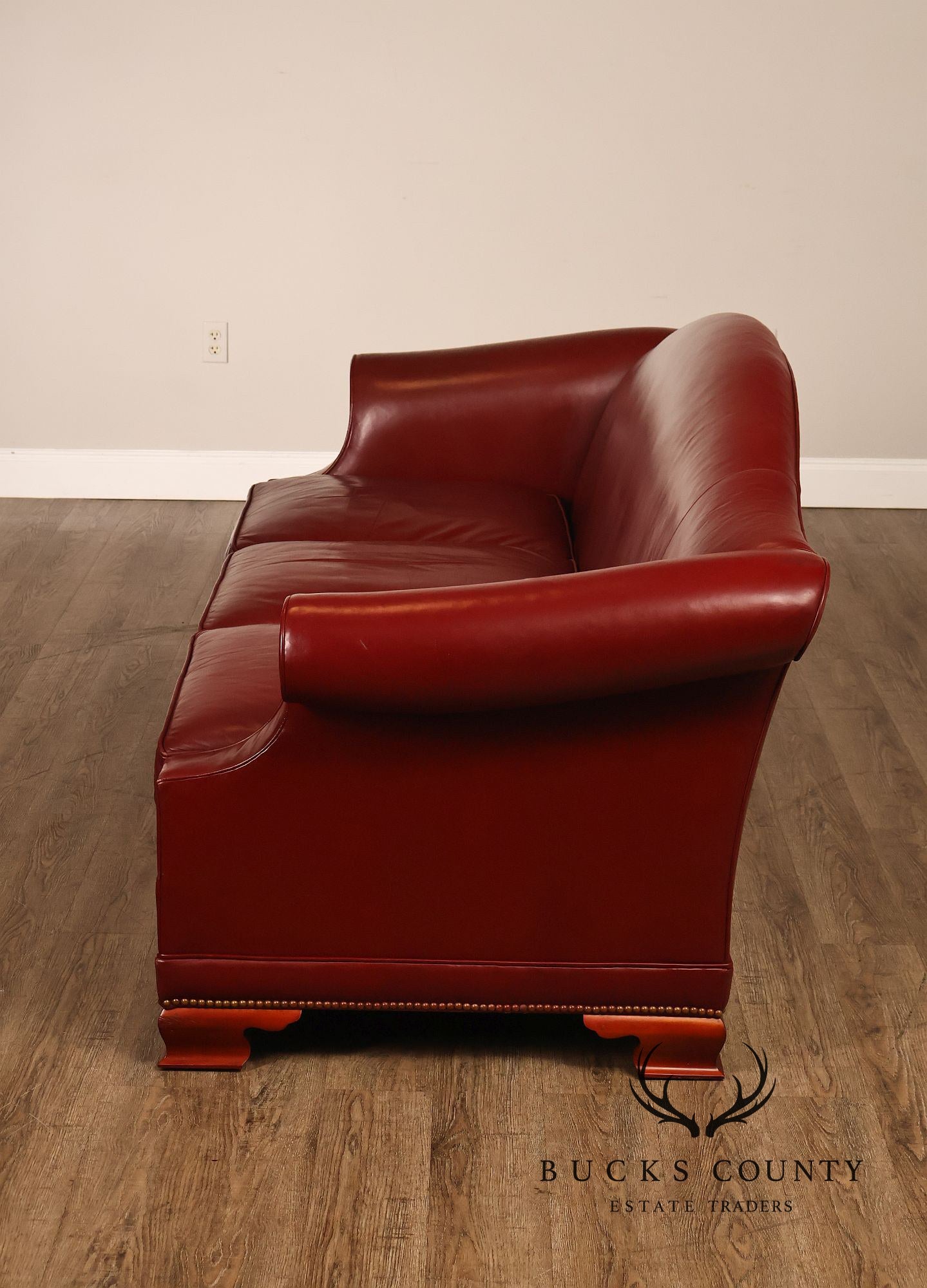 Kindel Vintage Camelback Back Leather Three Cushion Sofa