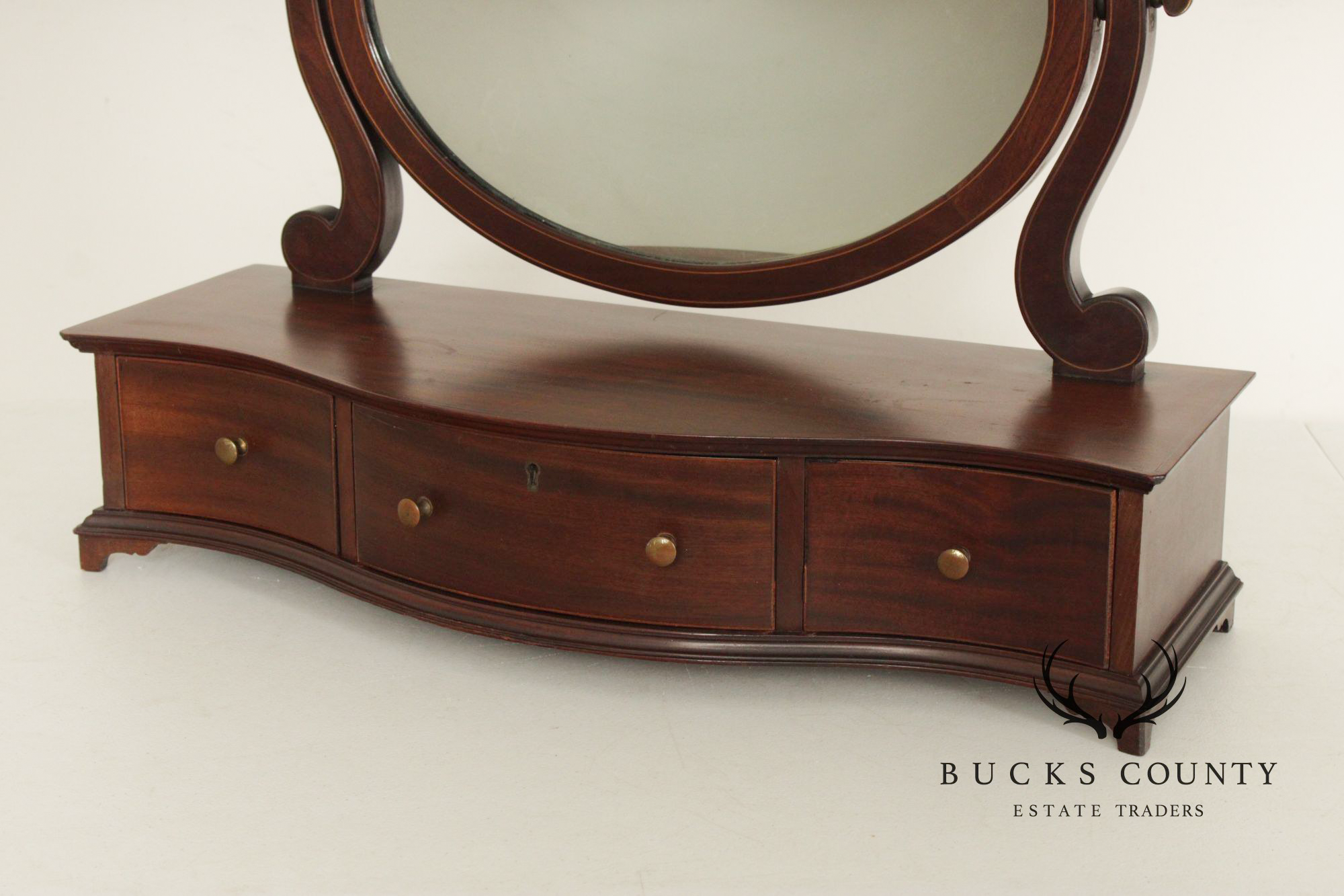 Potthast Bros. Federal Style Mahogany Shaving Mirror With Serpentine Base And Oval Swivel Glass