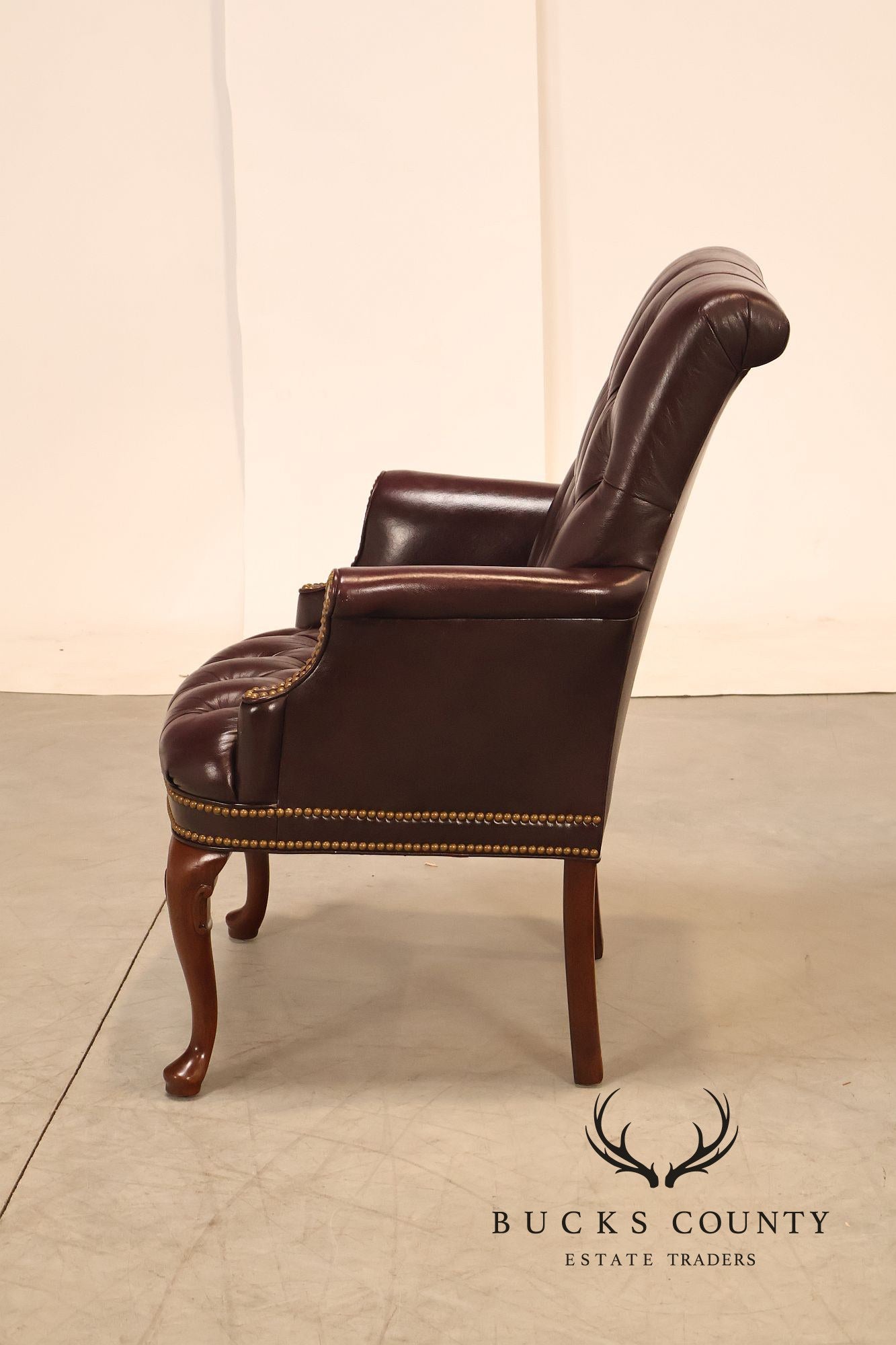 Hancock & Moore Pair of Tufted Leather and Mahogany Armchairs