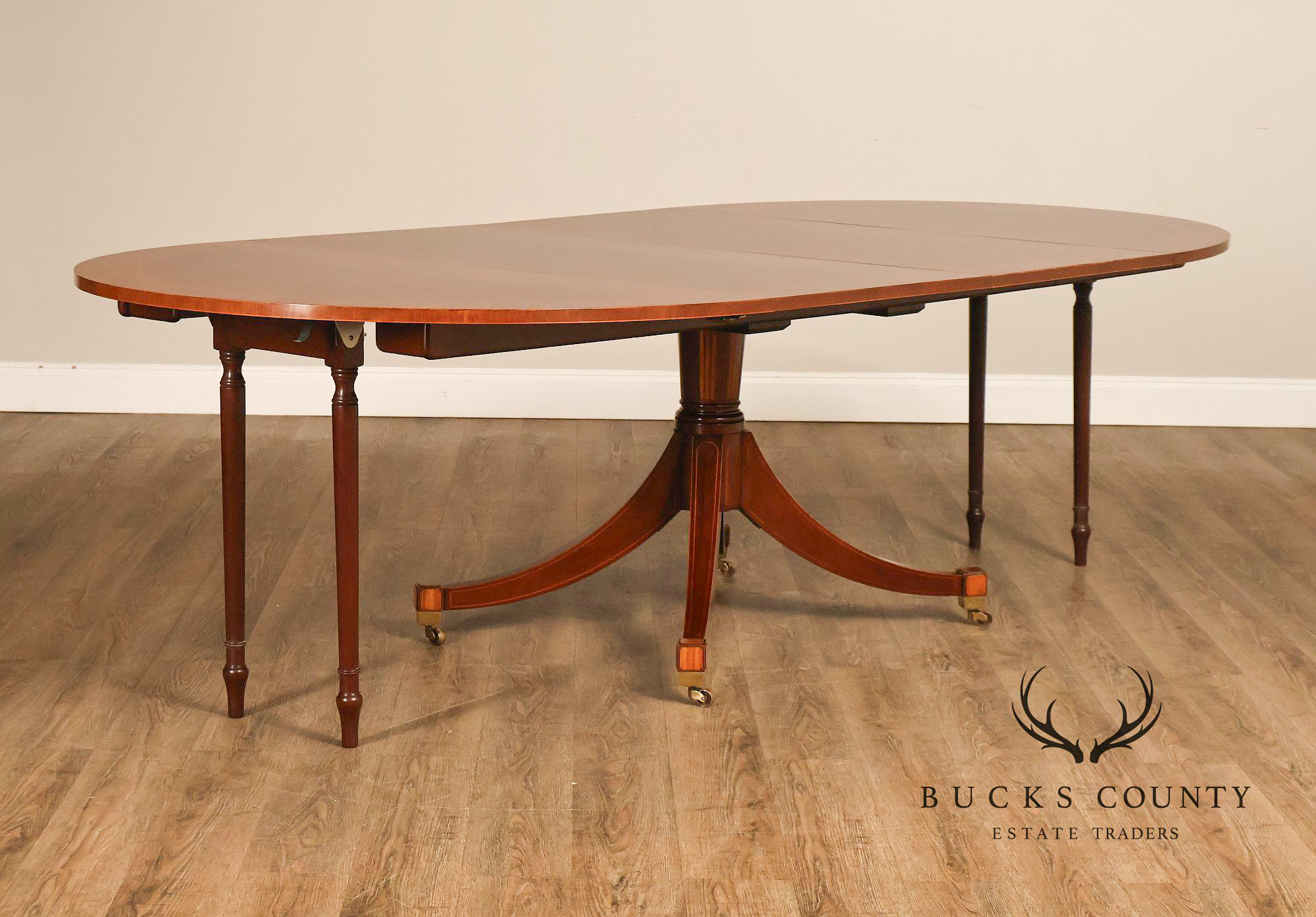 Baker Regency Style Banded Mahogany Extendable Dining Table