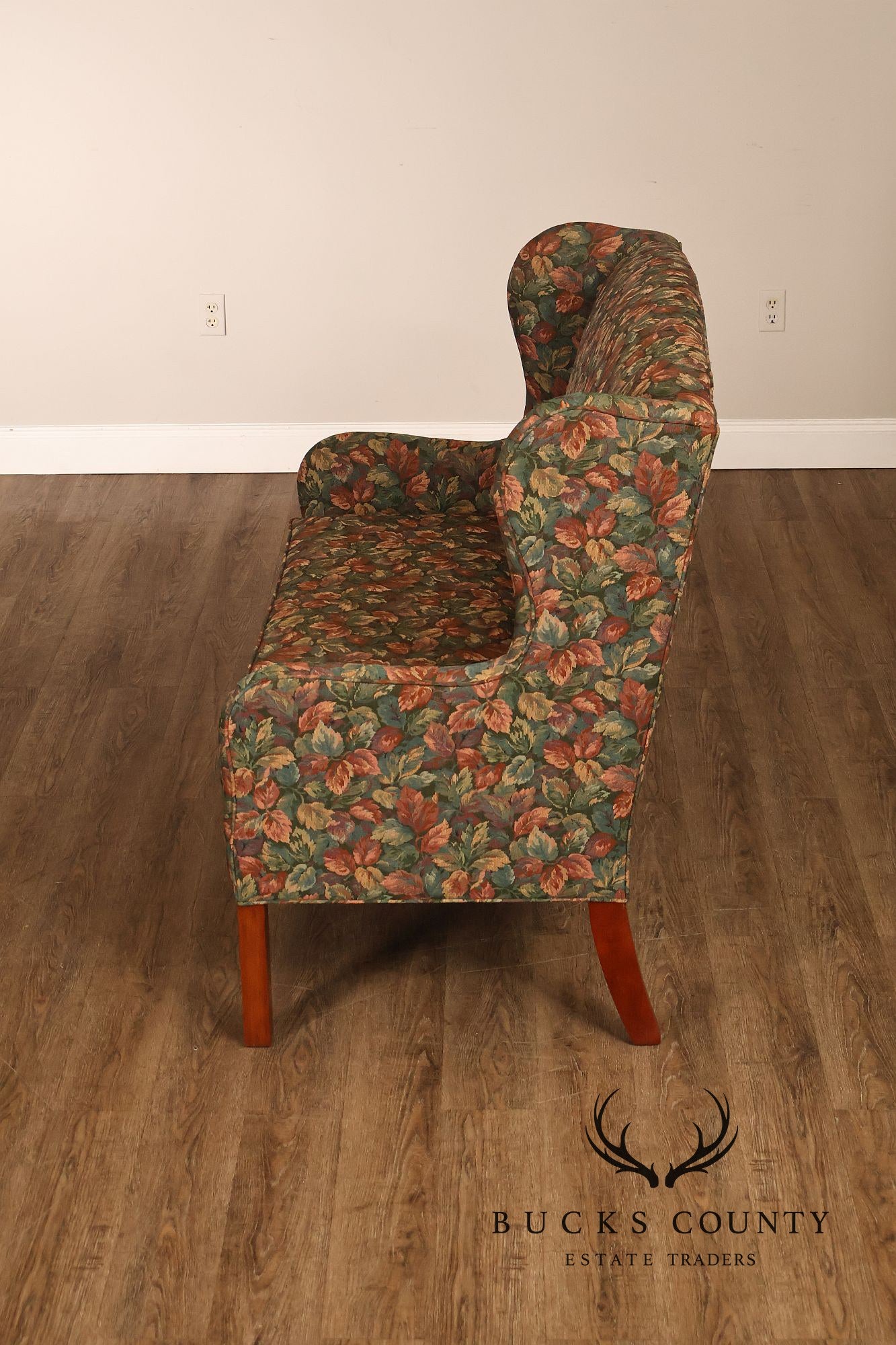 Traditional Upholstered Loveseat With Floral Fabric