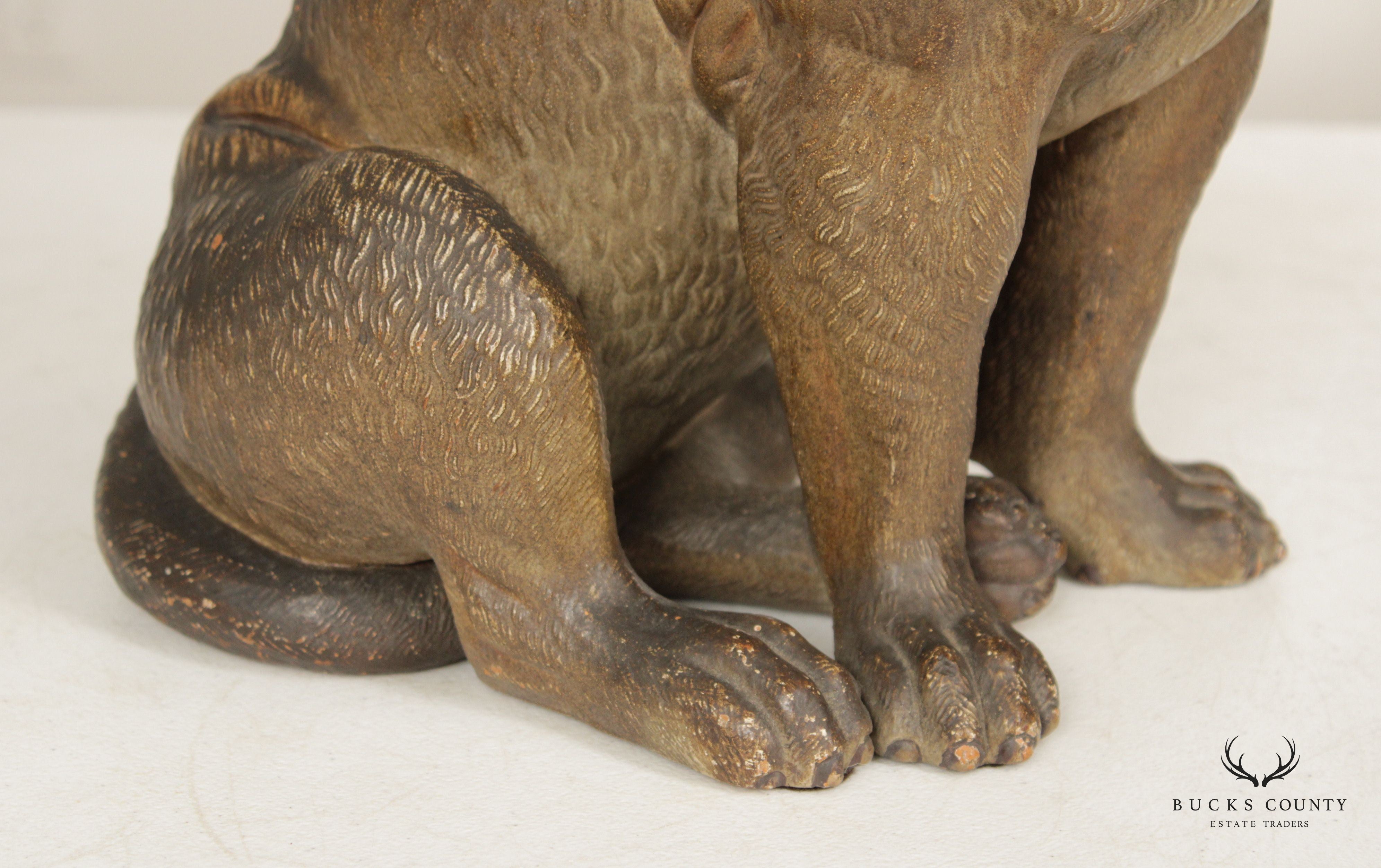 TERRA COTTA SITTING PUG DOG STATUE ATTRIBUTED TO GOLDSCHEIDER