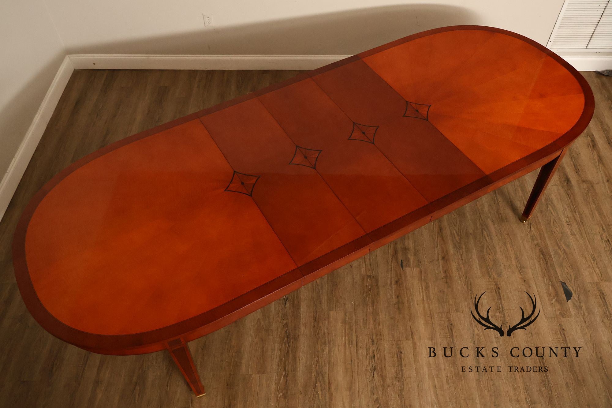 Kindel Kent Mahogany Banded Oval Dining Table with Three Leaves