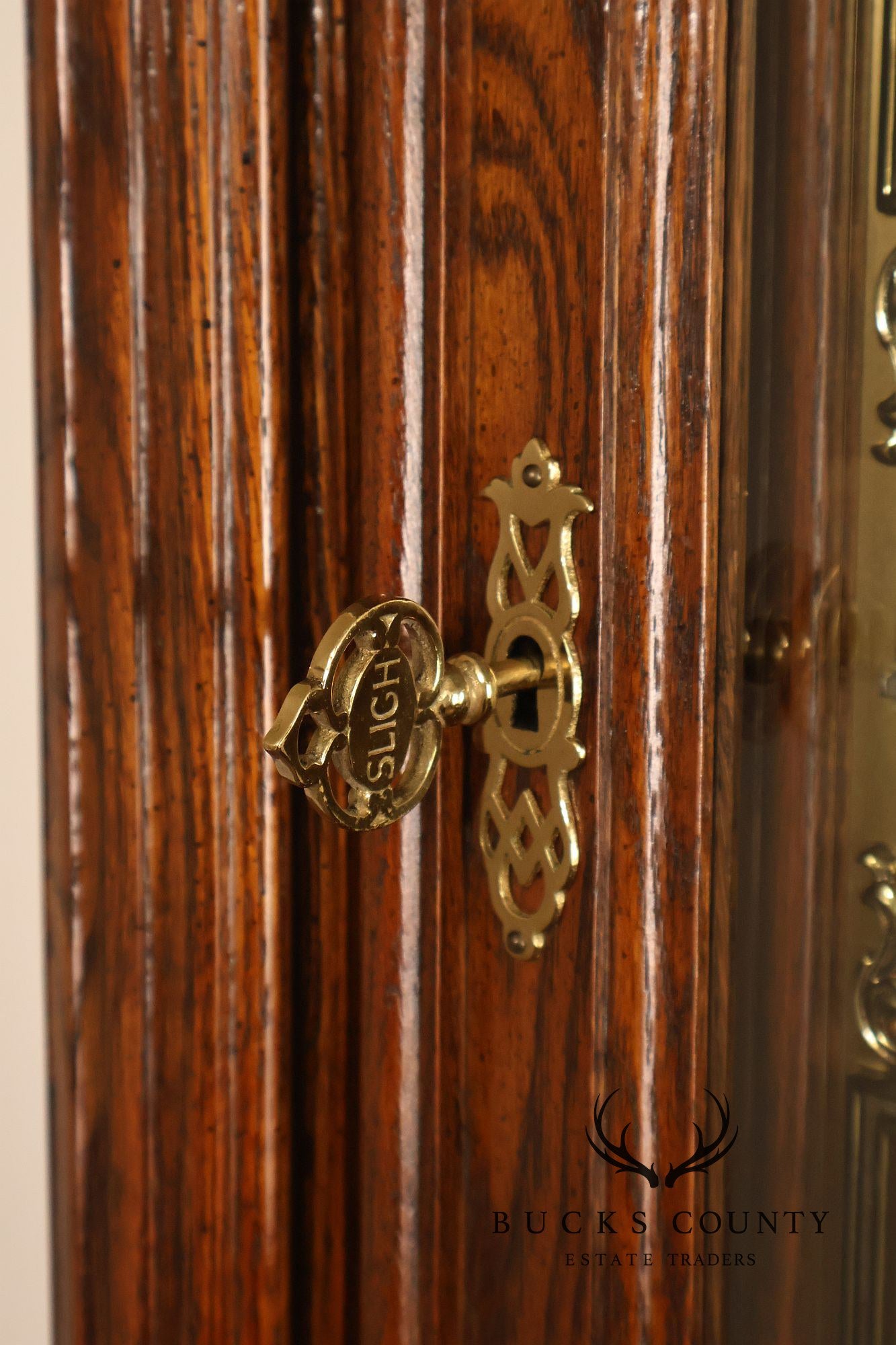 Sligh Traditional Oak Triple Chime Grandfather Clock With Moon Phase Dial