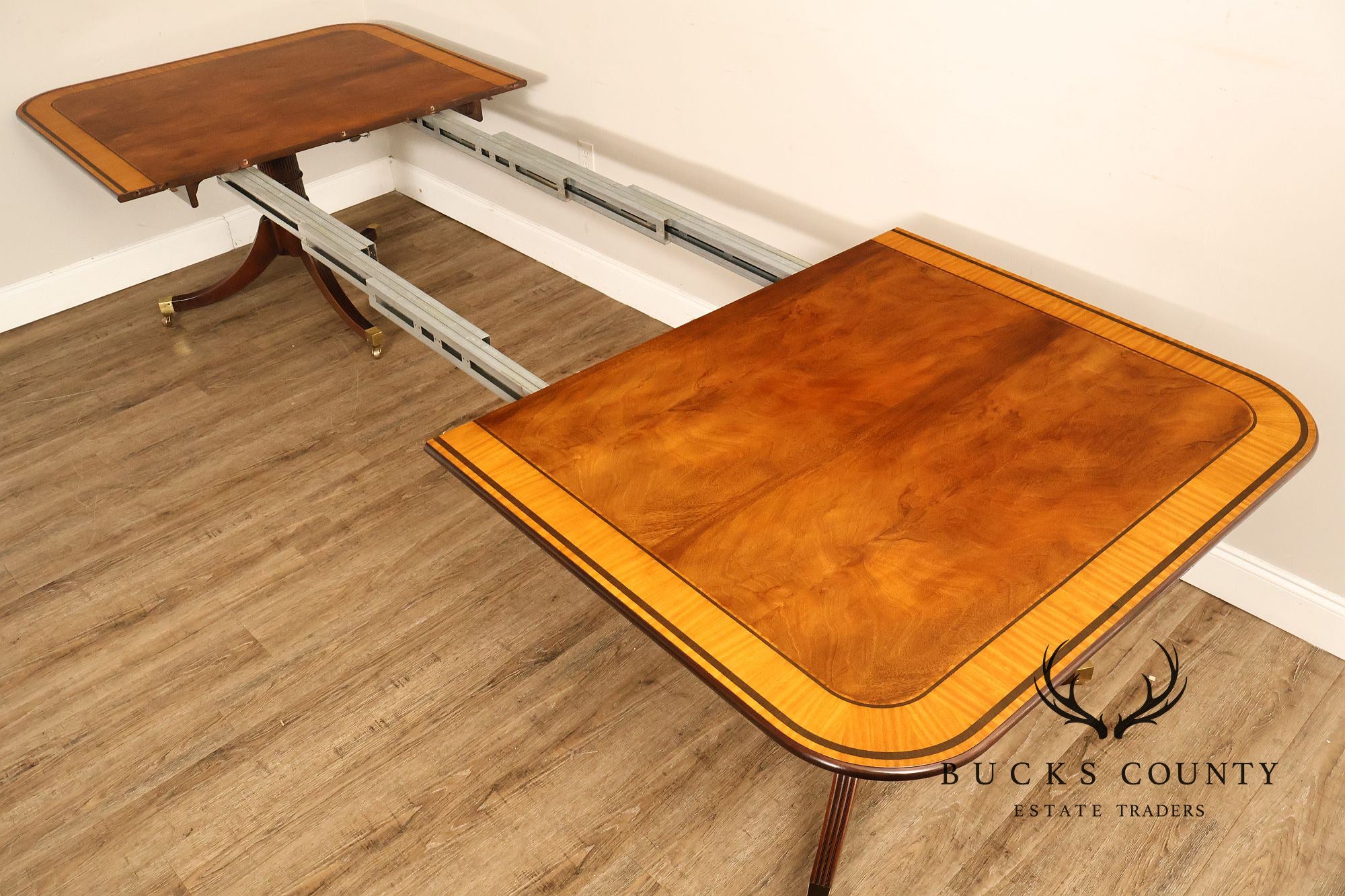 Baker Stately Homes Mahogany Double Pedestal Extendable Dining Table
