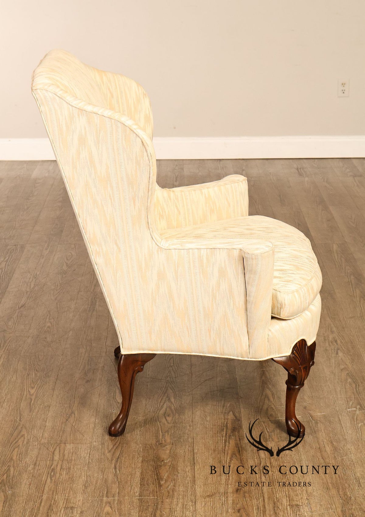Traditional Upholstered Pair Of Wingback Armchairs With Carved Cabriole Legs