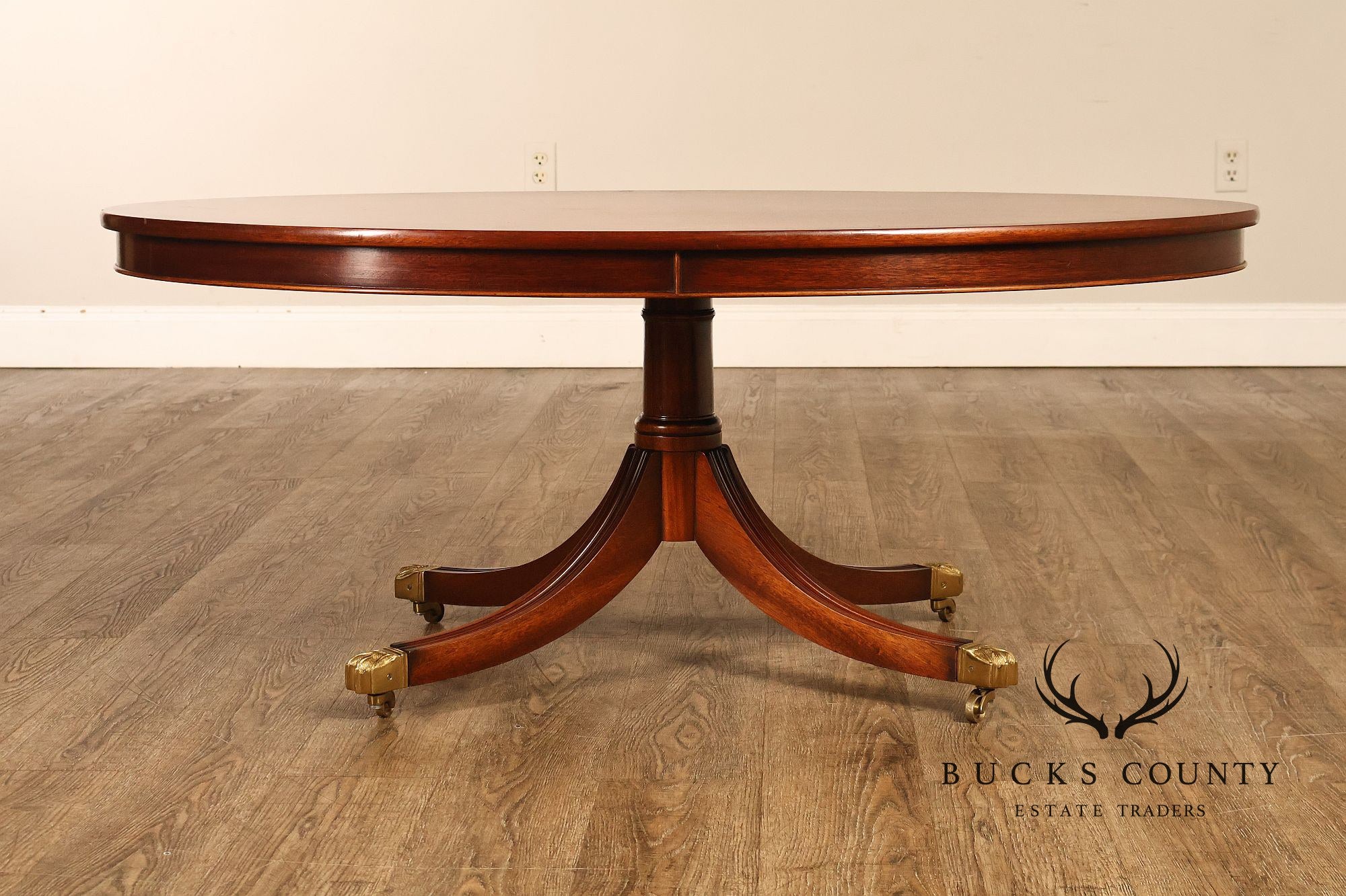 Regency Style Flame Mahogany Oval Top Coffee Table