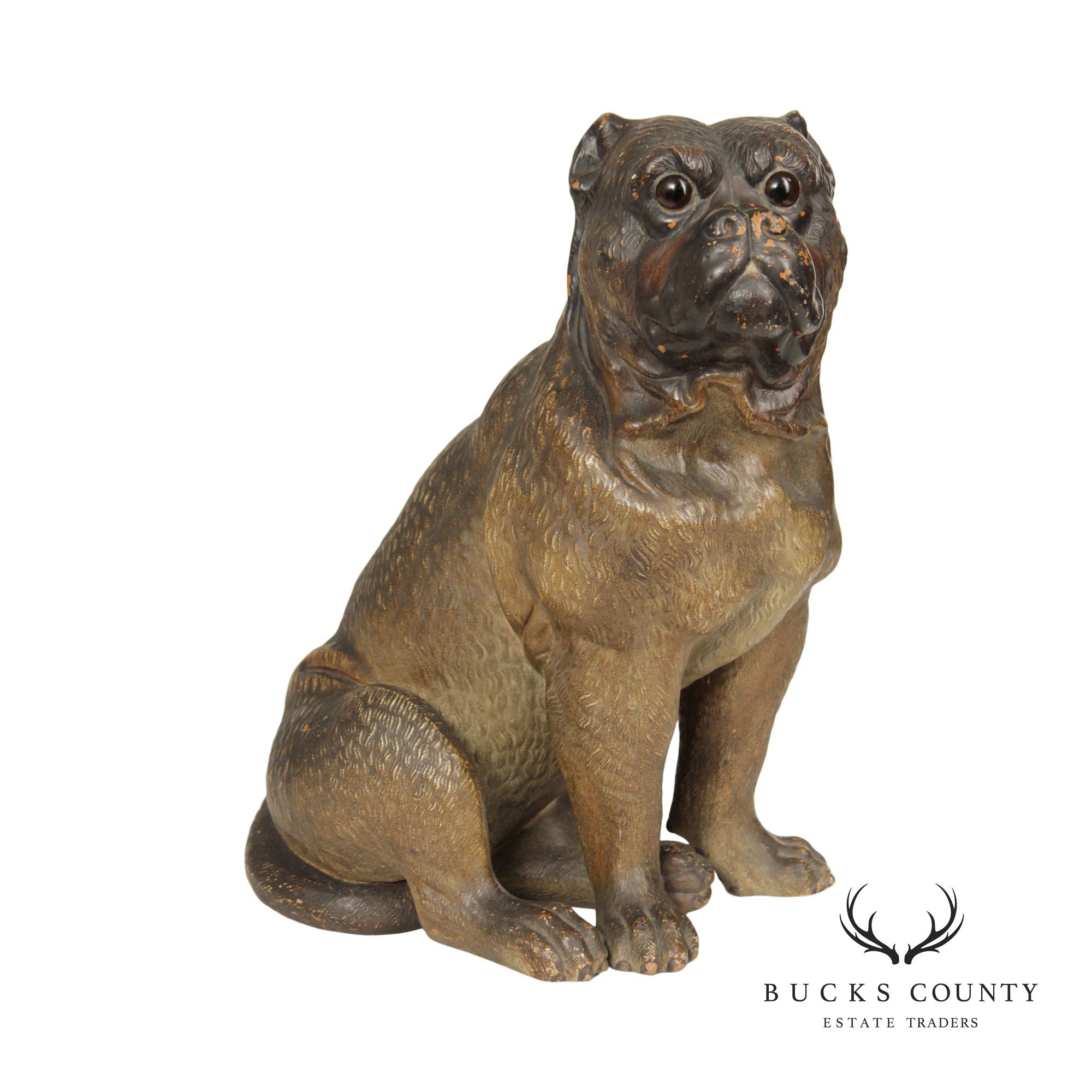 TERRA COTTA SITTING PUG DOG STATUE ATTRIBUTED TO GOLDSCHEIDER