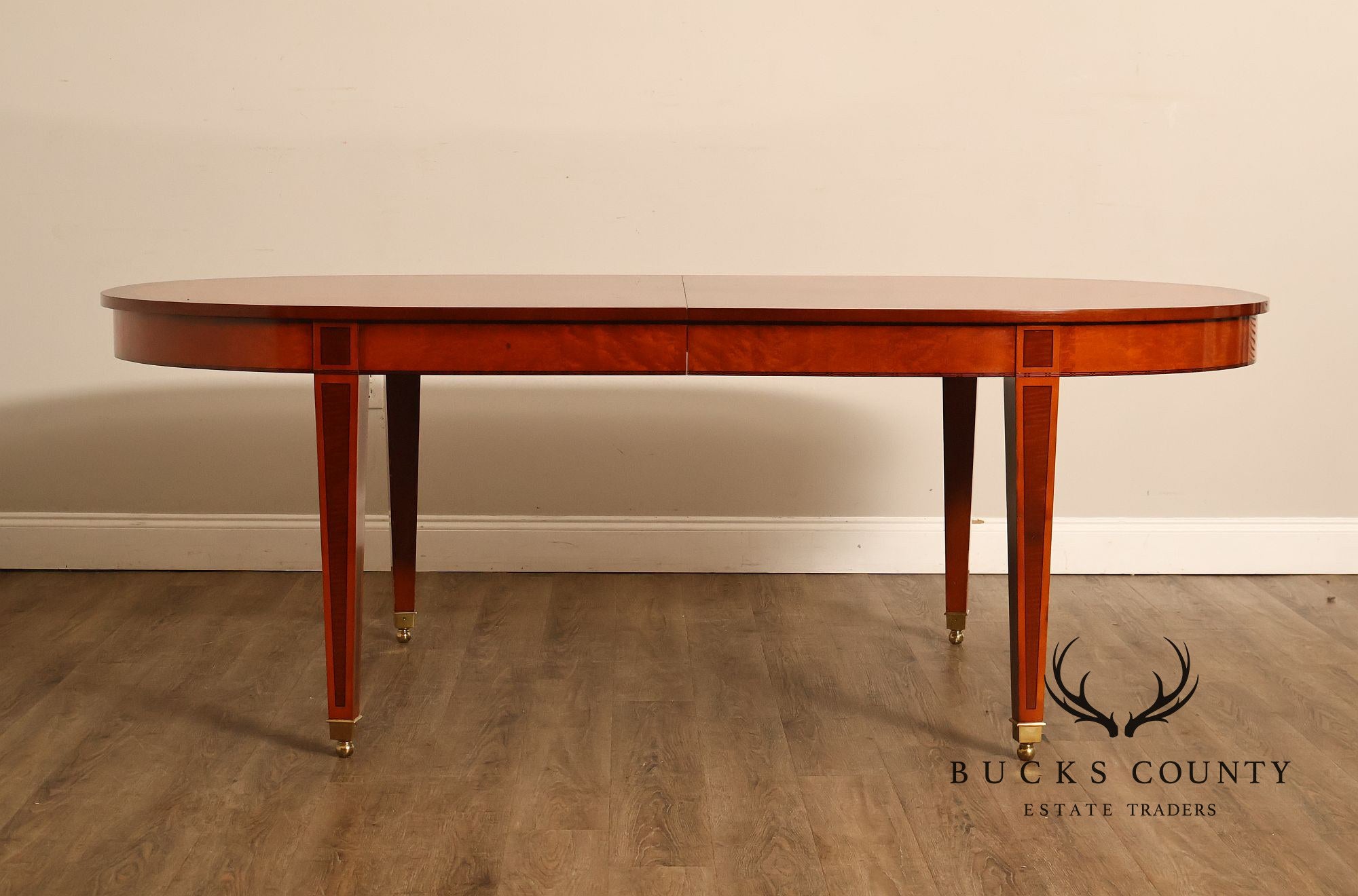 Kindel Kent Mahogany Banded Oval Dining Table with Three Leaves