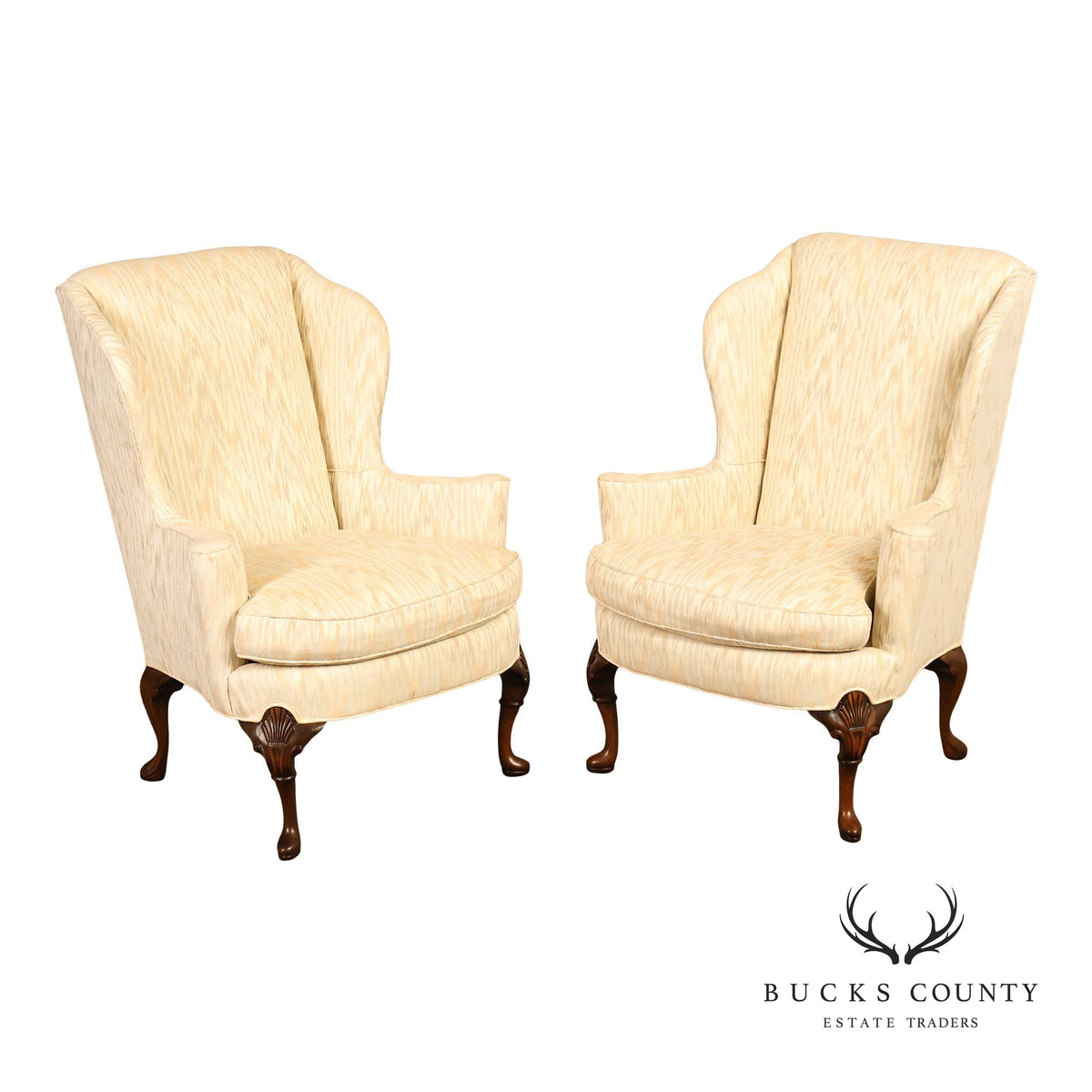 Traditional Upholstered Pair Of Wingback Armchairs With Carved Cabriole Legs