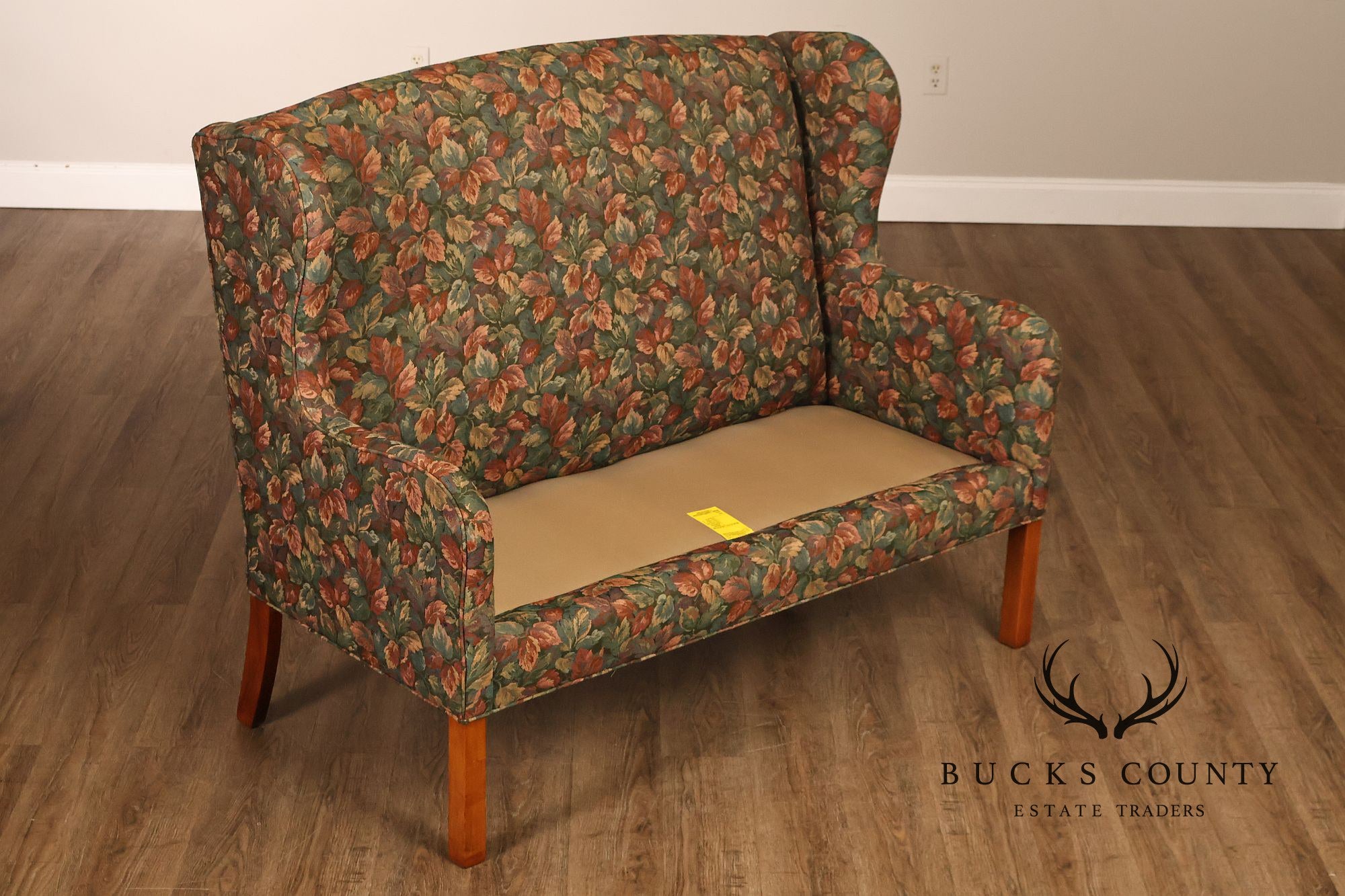 Traditional Upholstered Loveseat With Floral Fabric