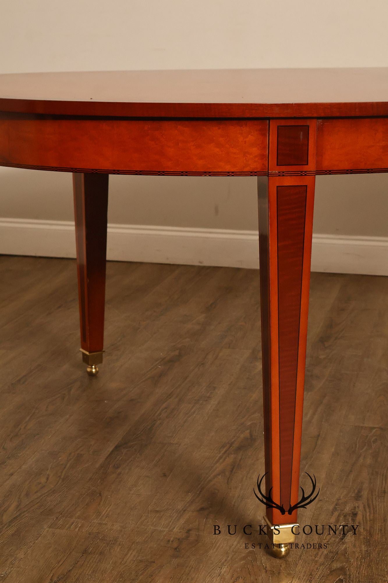Kindel Kent Mahogany Banded Oval Dining Table with Three Leaves