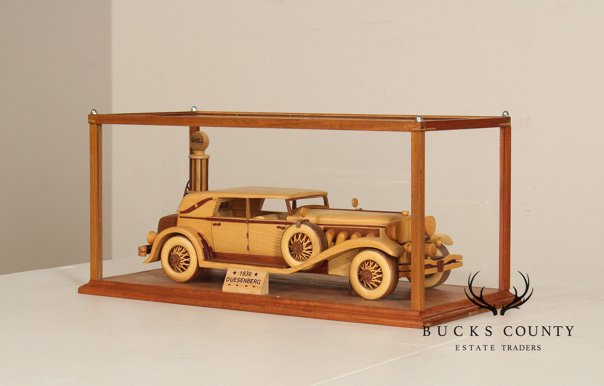 Carved Wood 1930 Duesenberg Model J in Display Case