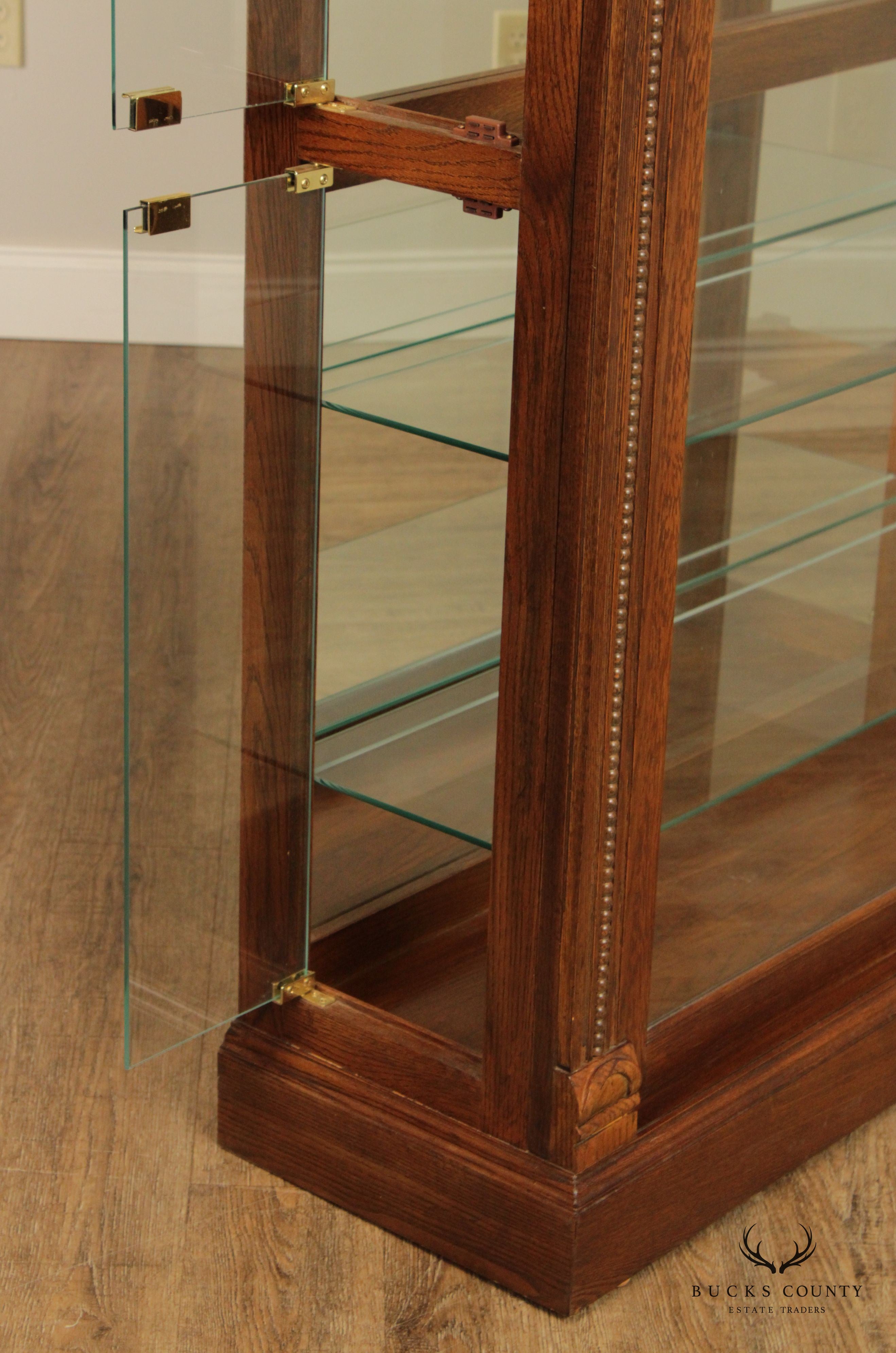 Pulaski Furniture Greek Revival Style Carved Oak Illuminated Display Cabinet