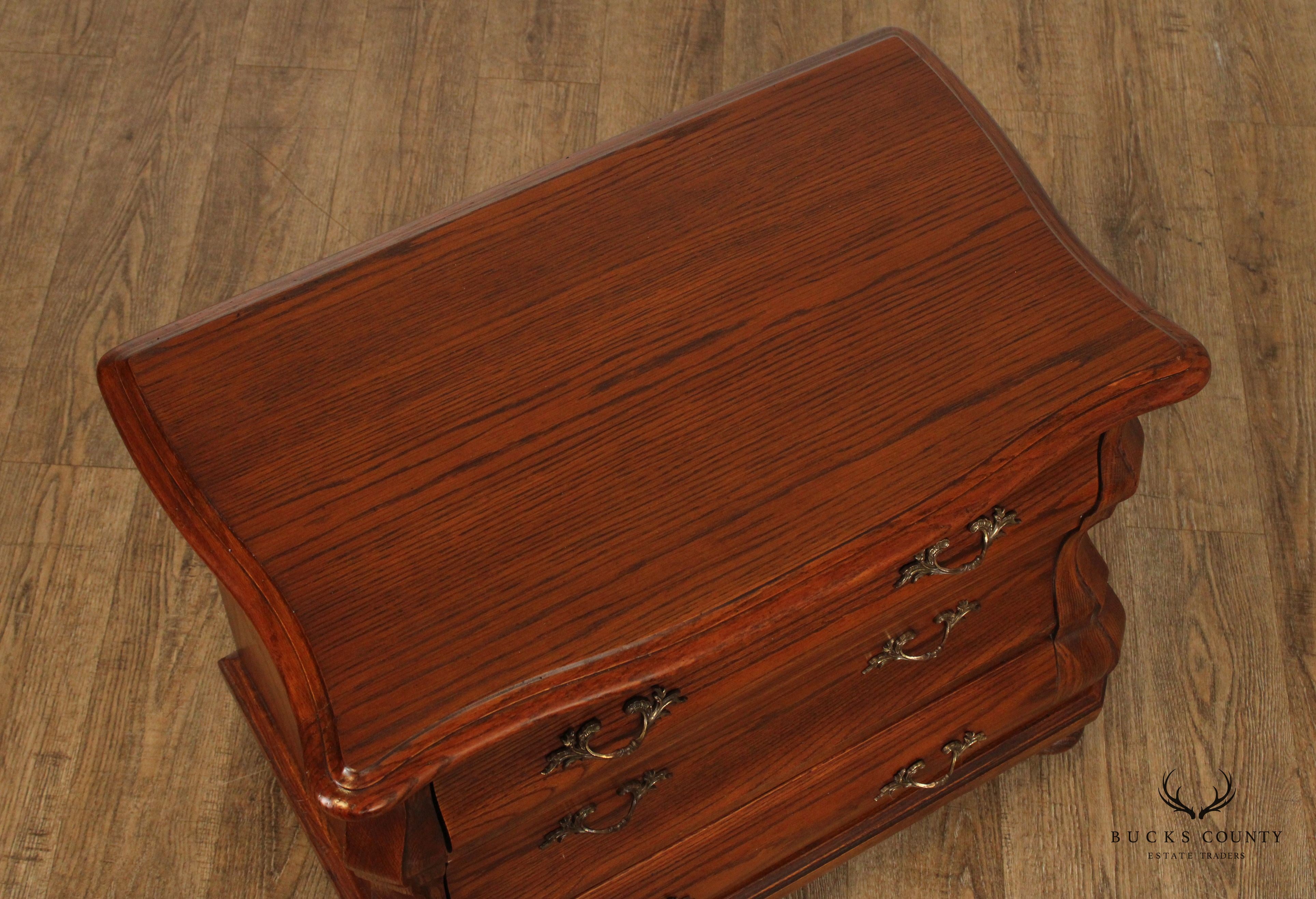 HEKMAN BAROQUE STYLE PAIR OF OAK BOMBE CHEST NIGHTSTANDS