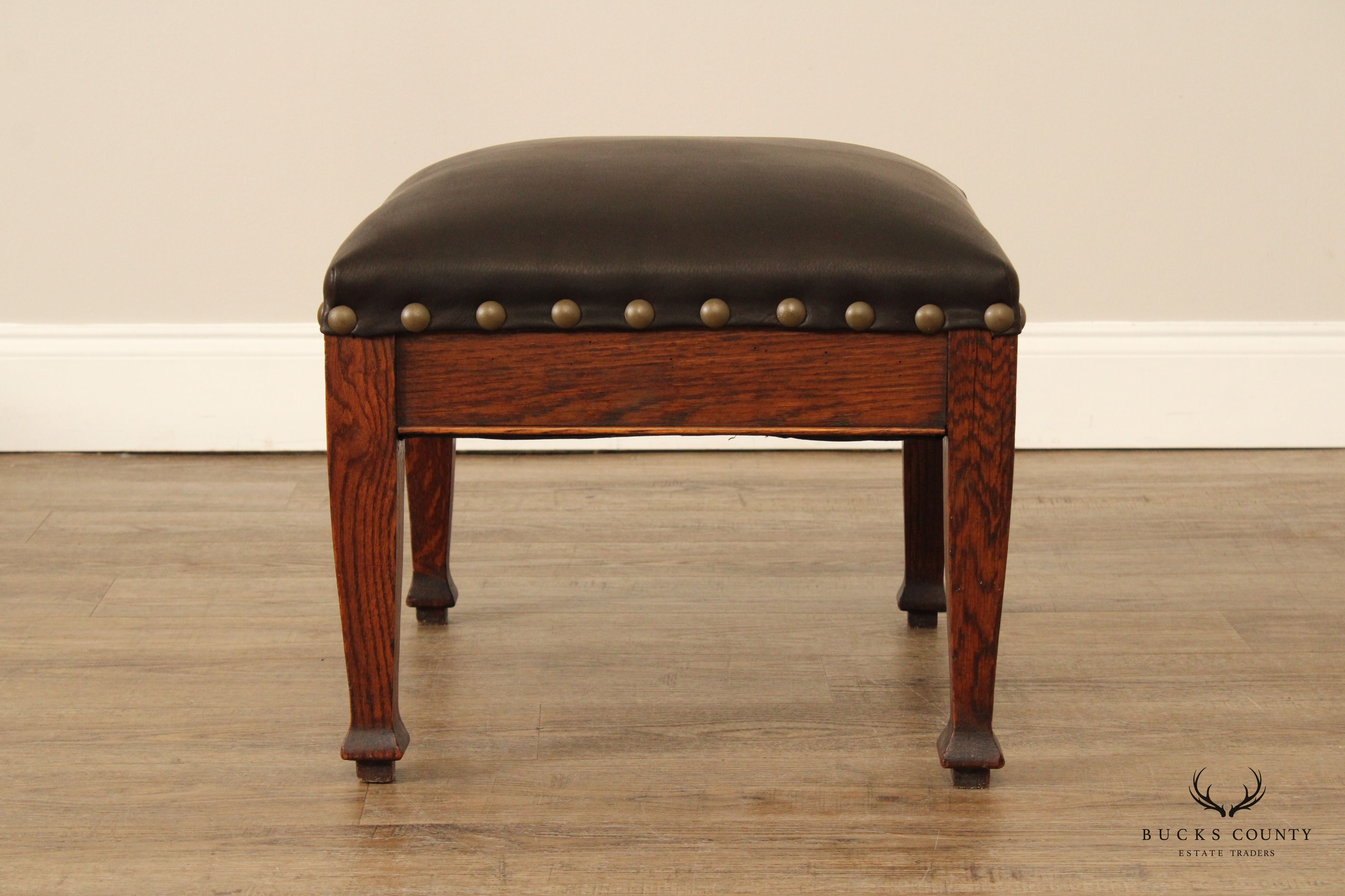 ANTIQUE MISSION OAK AND LEATHER FOOTSTOOL