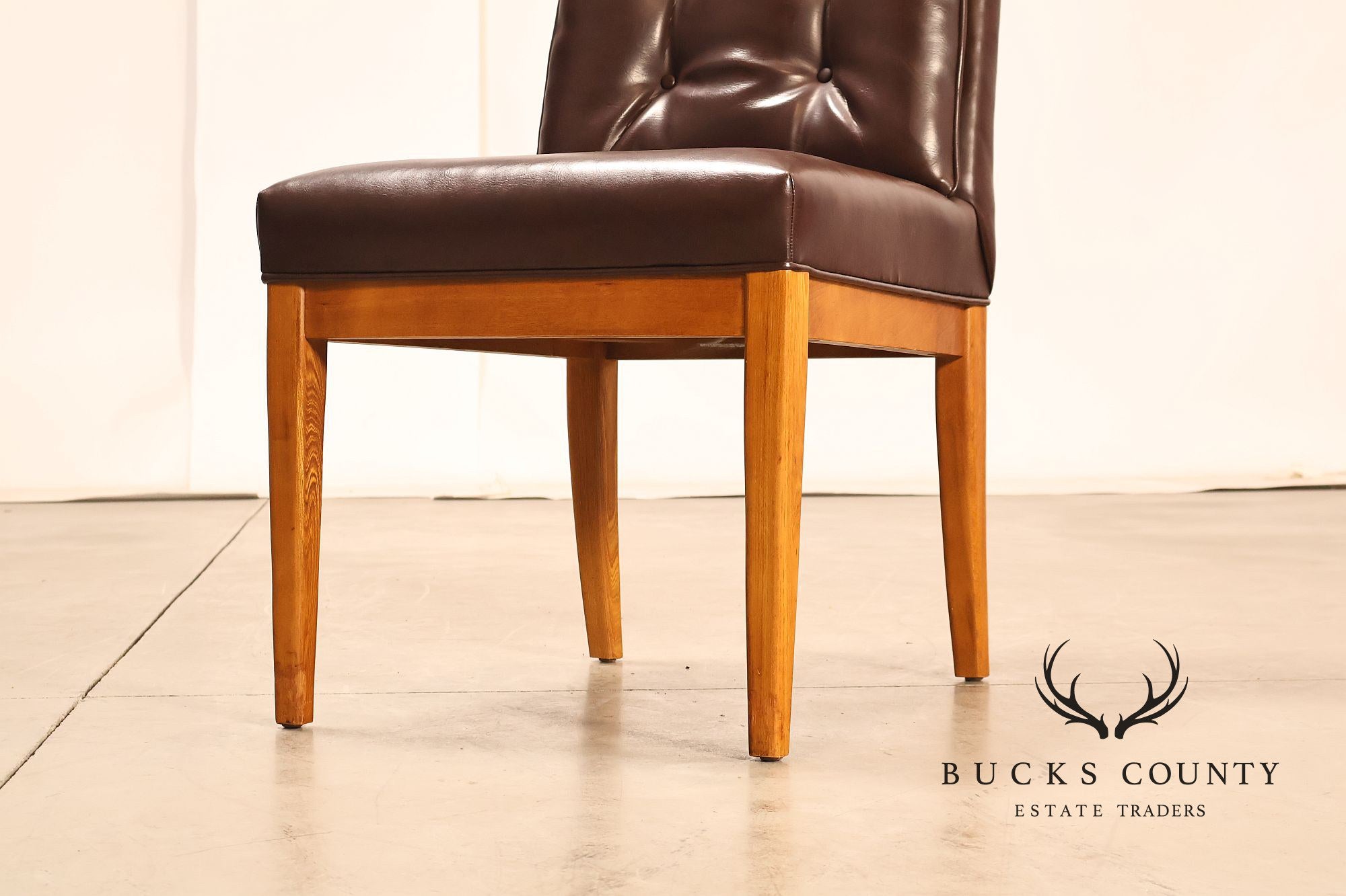Mid Century Modern Set of Eight Walnut and Leather Dining Chairs