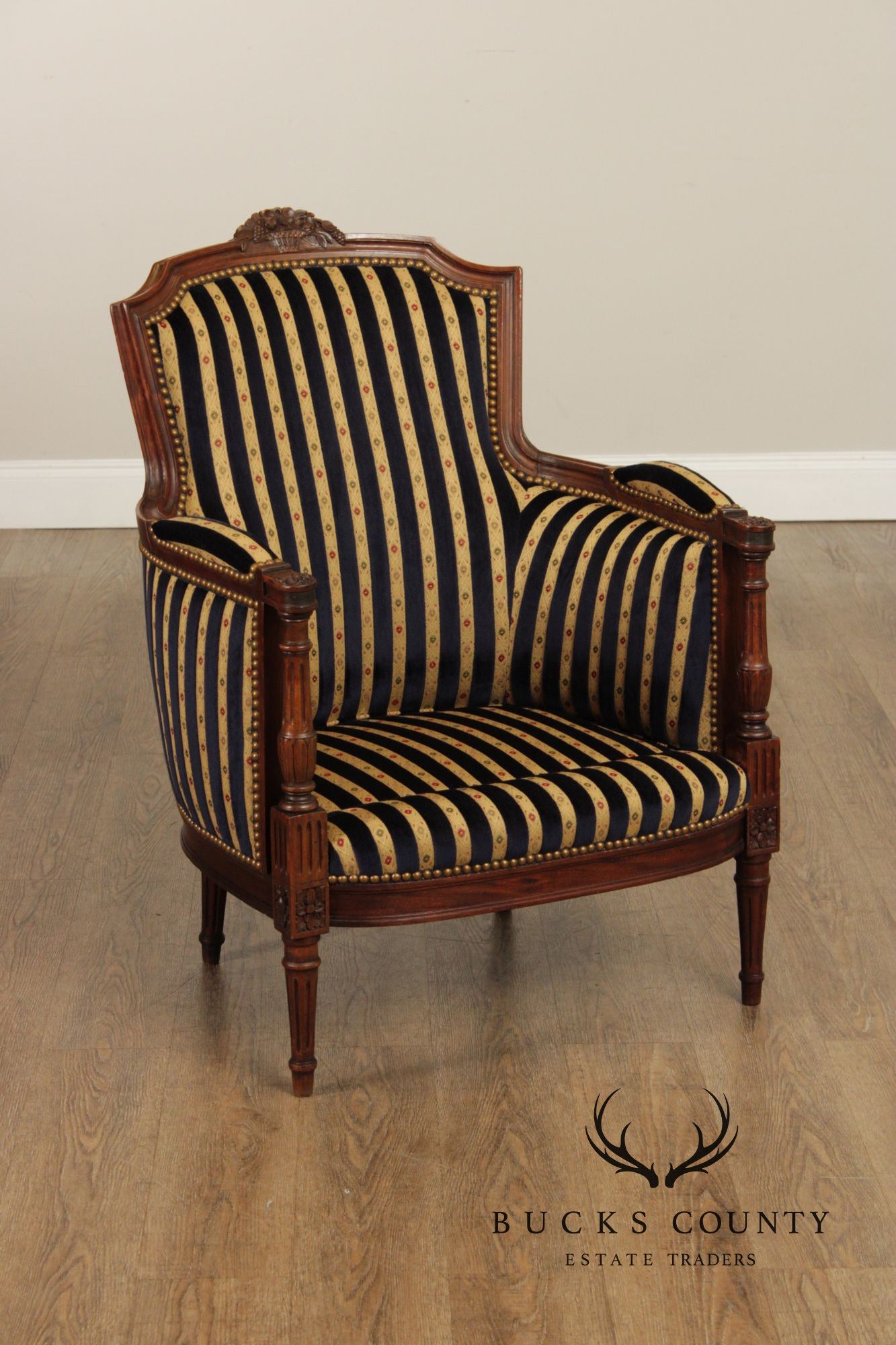 French Louis XVI Style Pair of Carved Walnut Bergere Armchairs