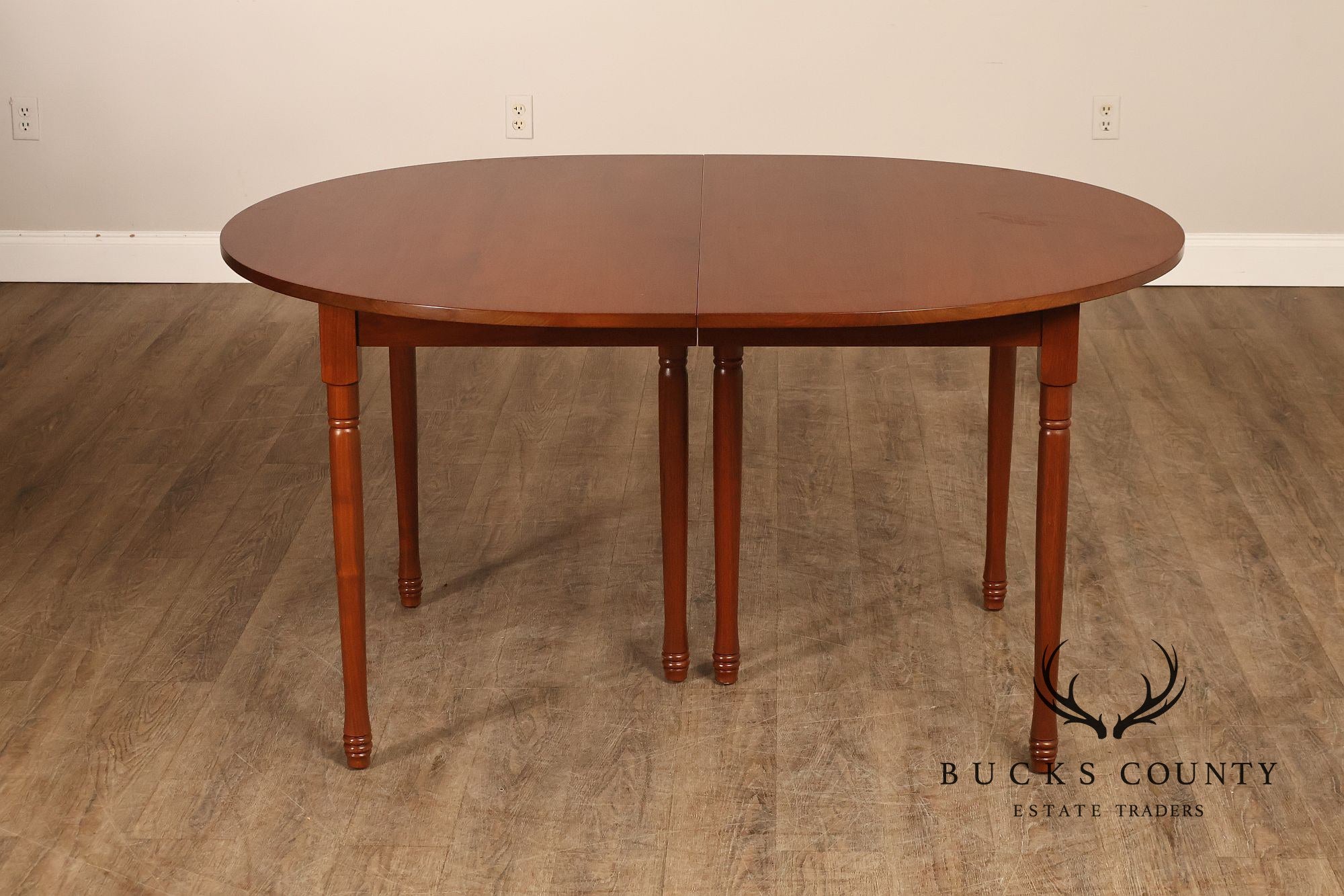 E. A. Clore Custom Walnut Extendable Dining Table With Four Leaves