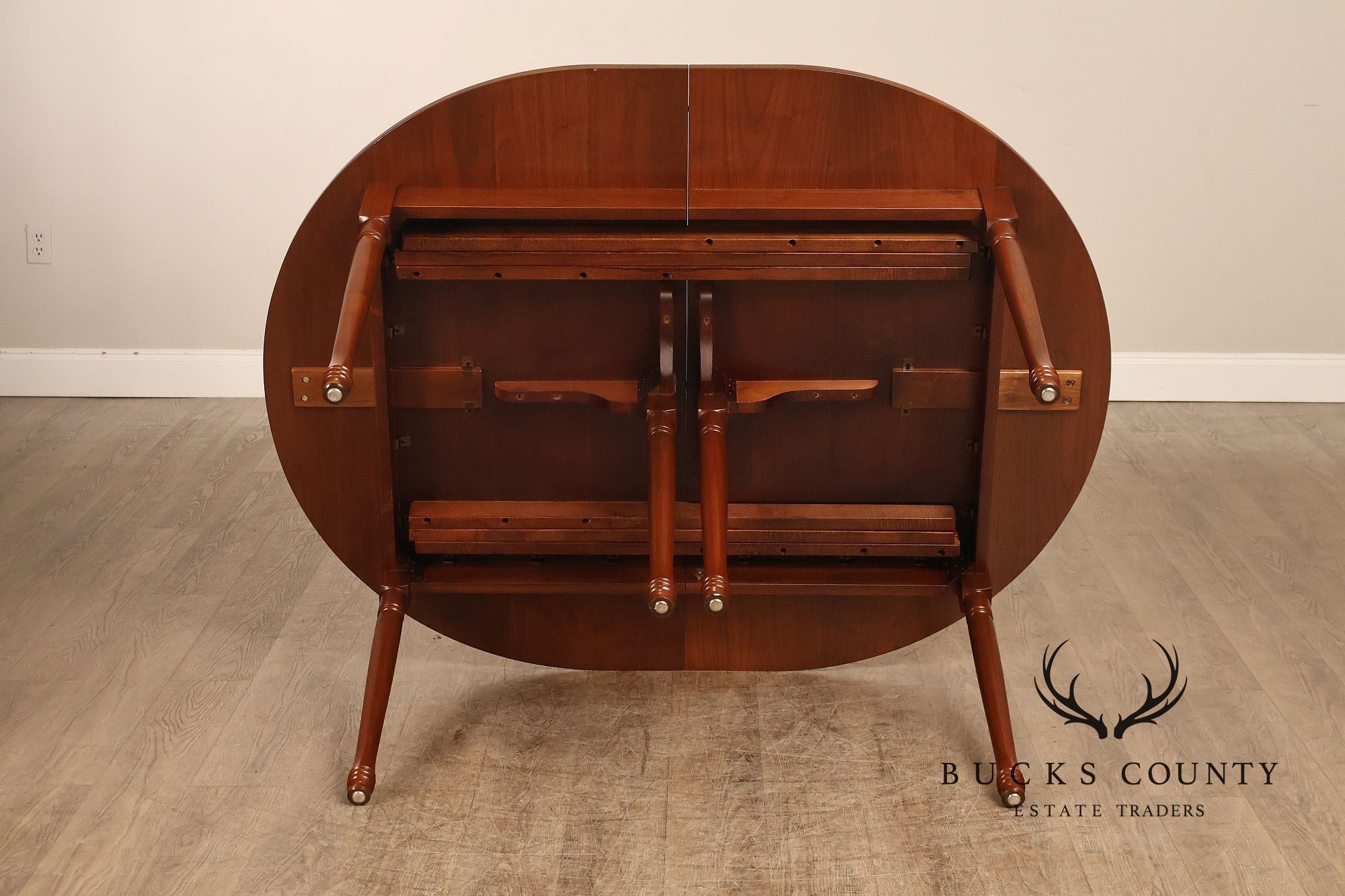E. A. Clore Custom Walnut Extendable Dining Table With Four Leaves
