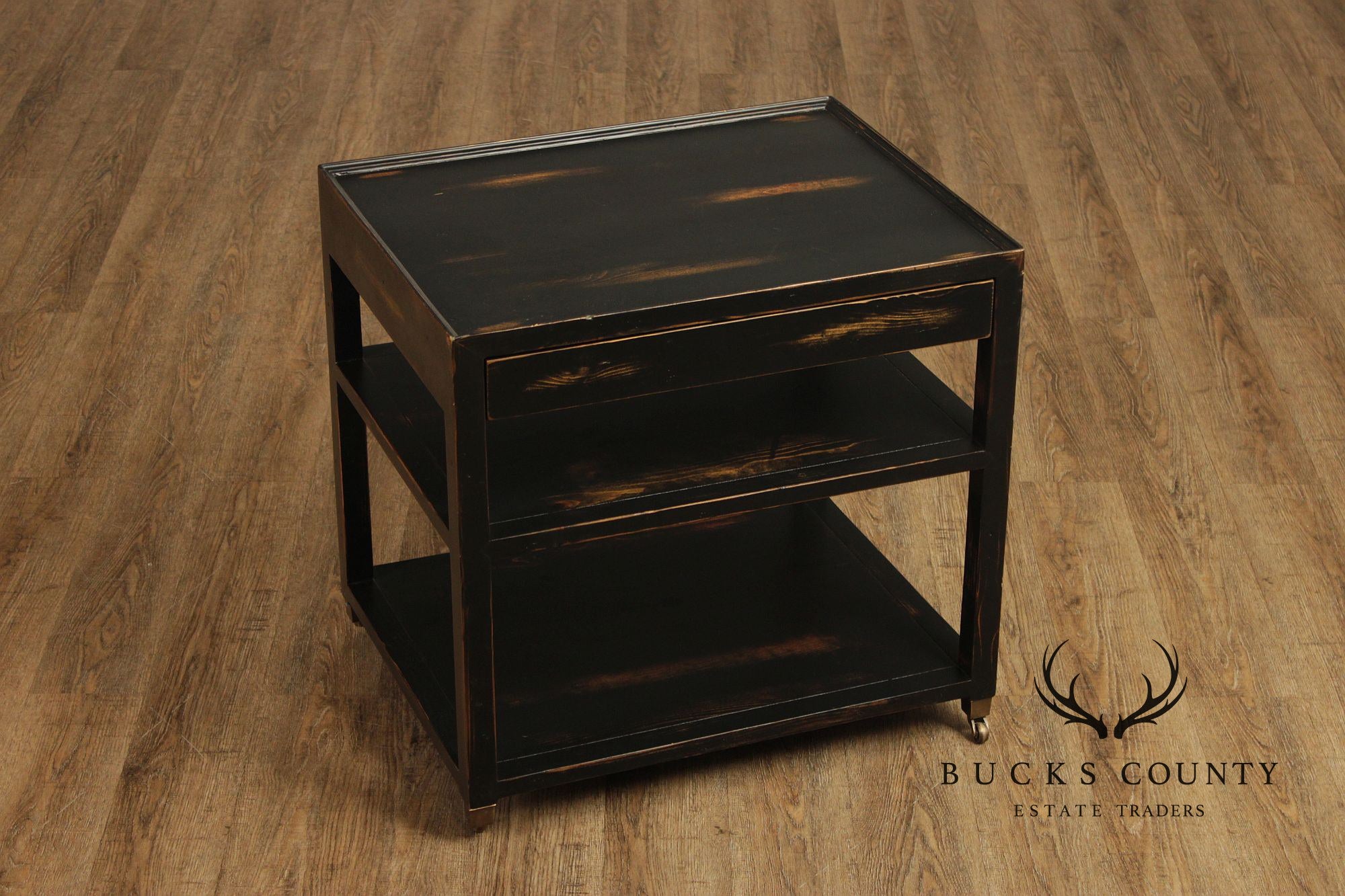 Industrial Style Pair of Ebonized Rolling End Tables
