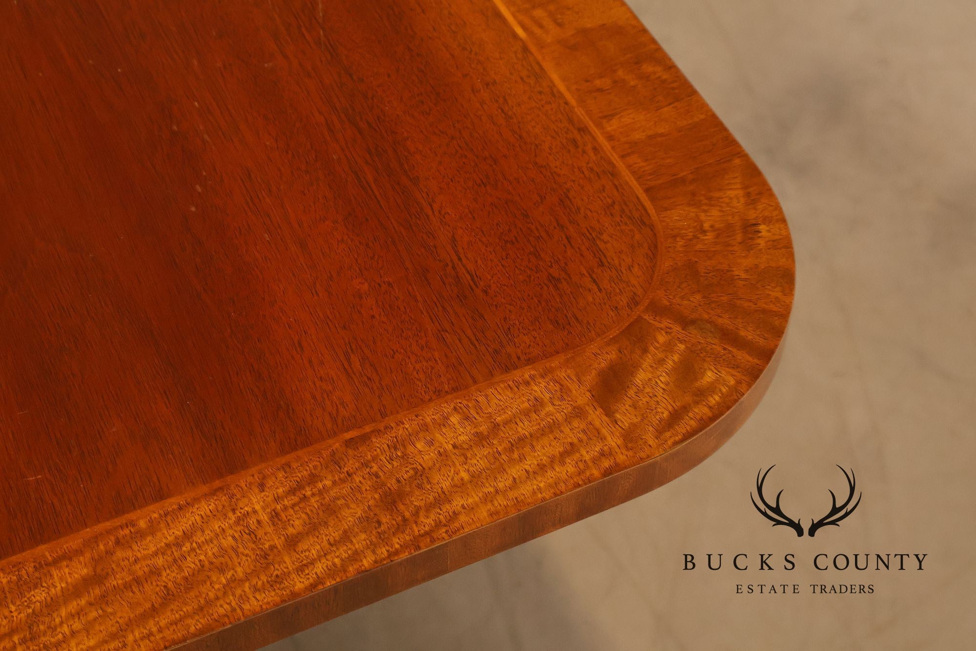 Baker Furniture Company Regency Style Mahogany Double Pedestal Dining Table With Satinwood Banding And Extension Leaves