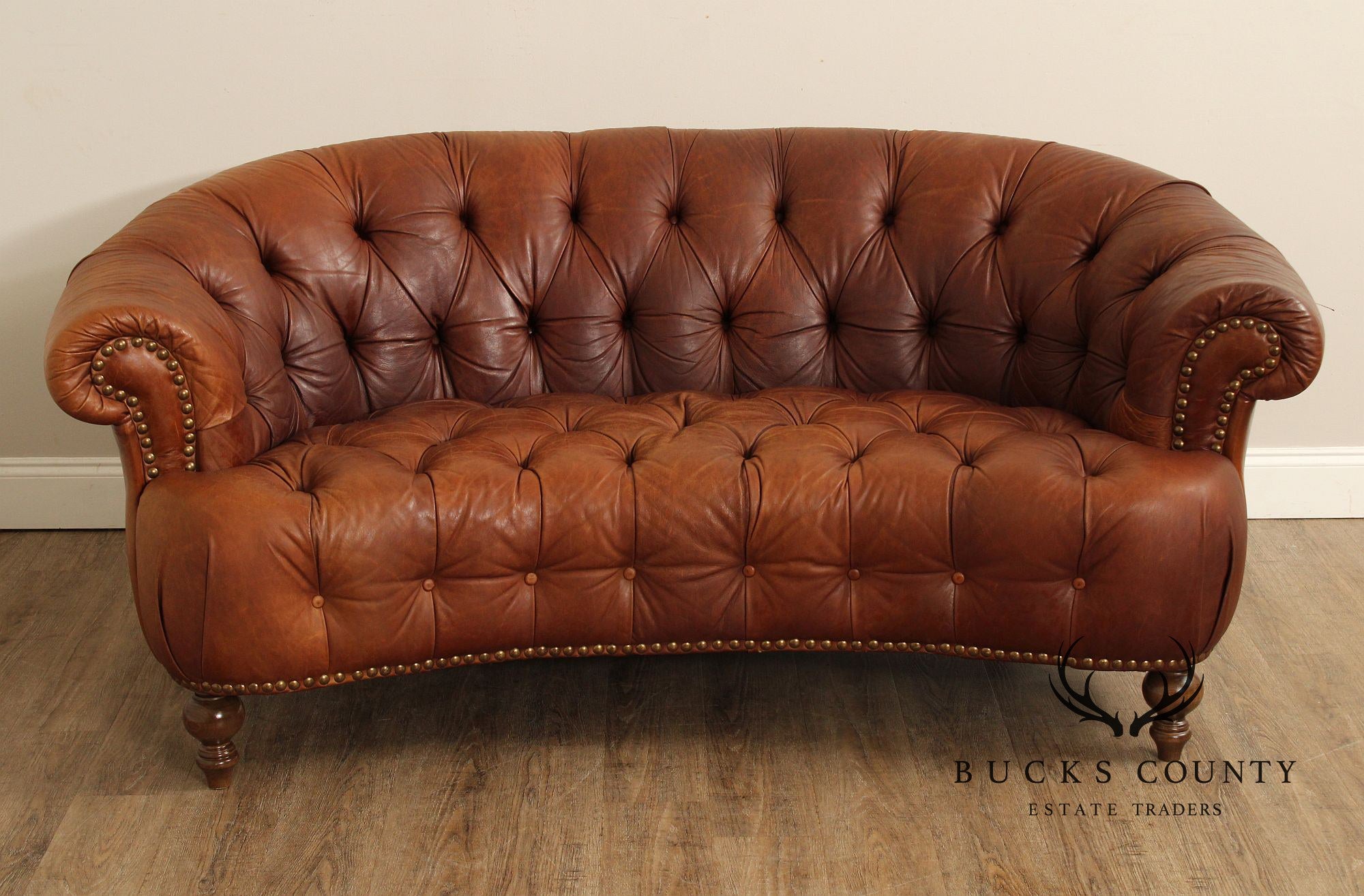 English Traditional Tufted Leather Curved Chesterfield Sofa