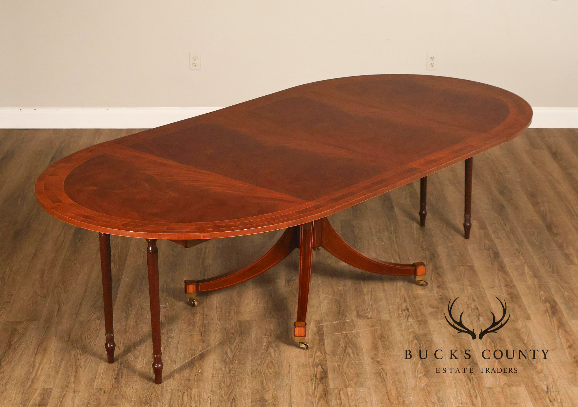 Baker Regency Style Banded Mahogany Extendable Dining Table