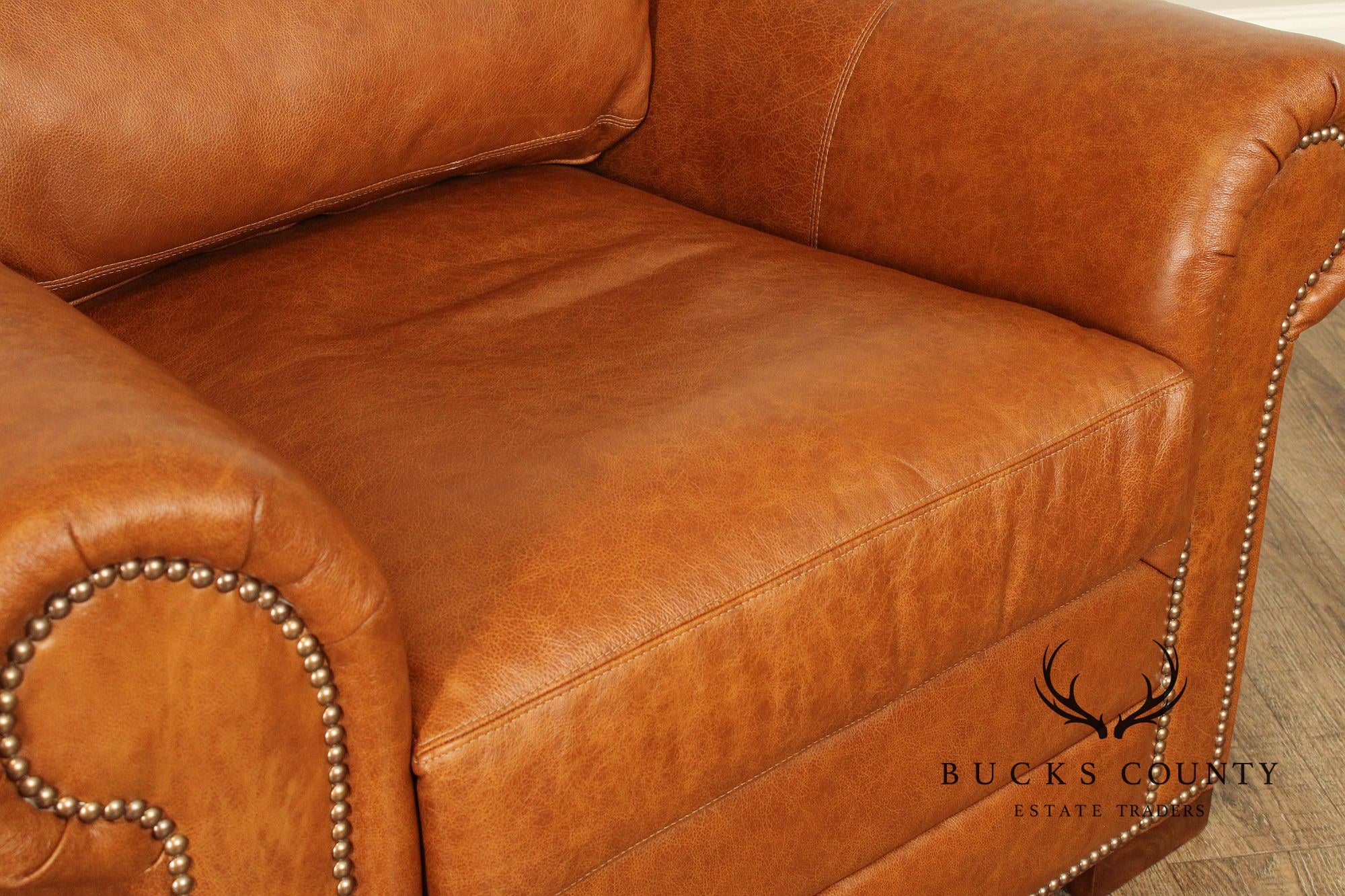 Leather Upholstered Chair & Ottoman