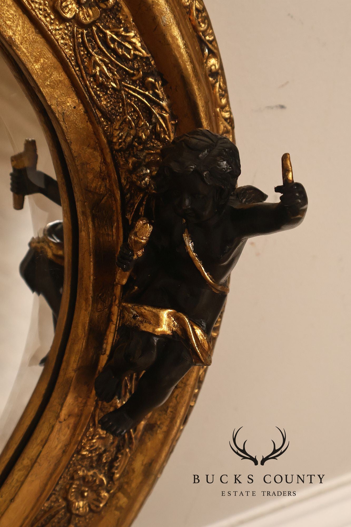 Italian Renaissance Style Cherub Mounted Oval Mirror