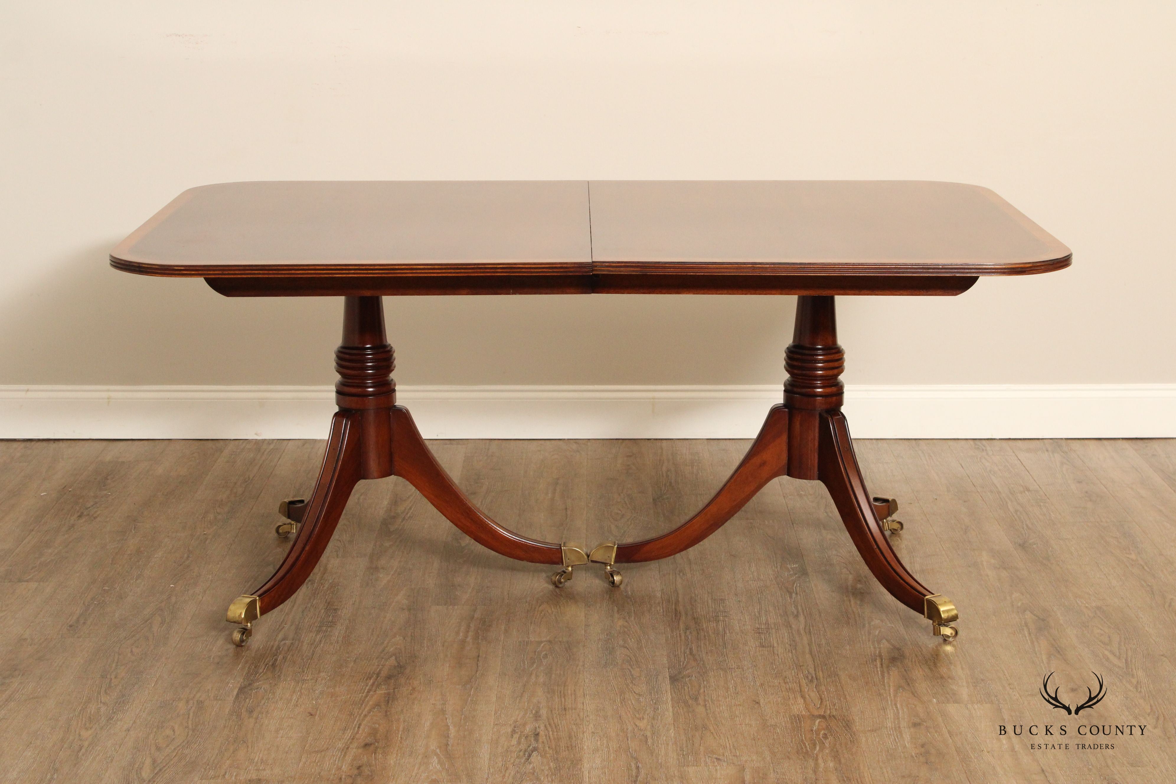 English Regency Style Mahogany Expandable Pedestal Dining Table