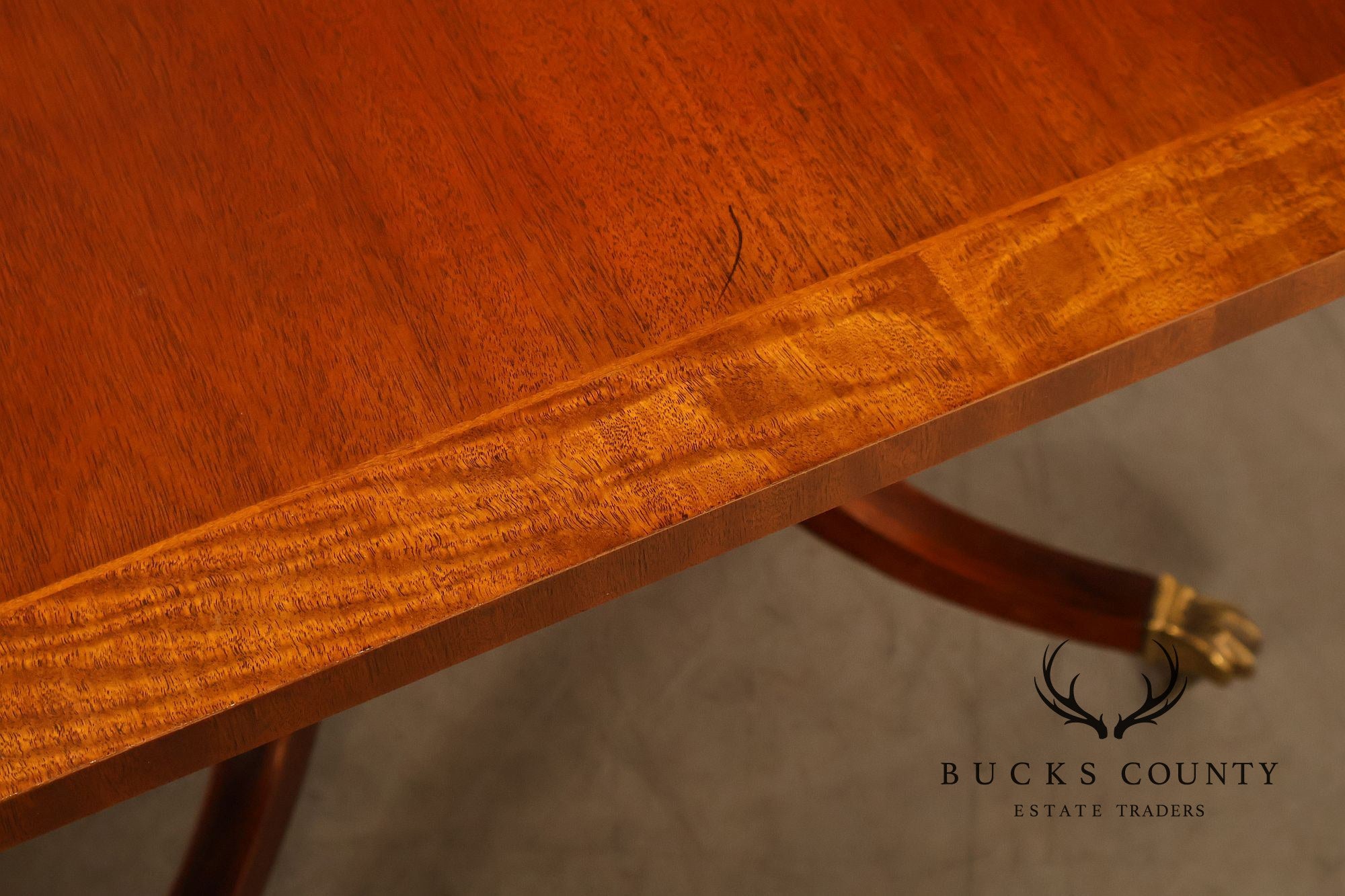 Baker Furniture Company Regency Style Mahogany Double Pedestal Dining Table With Satinwood Banding And Extension Leaves