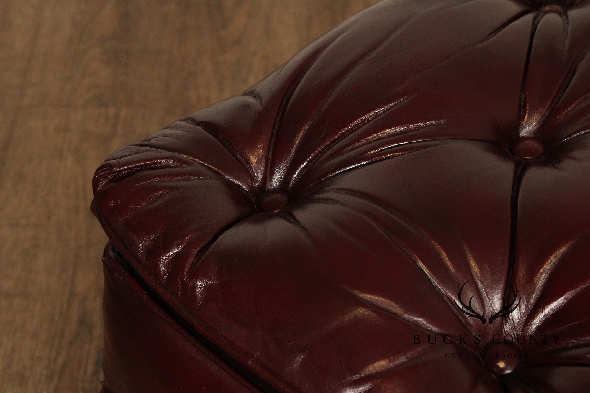 NORTH HICKORY OXBLOOD TUFTED LEATHER CHAIR AND OTTOMAN