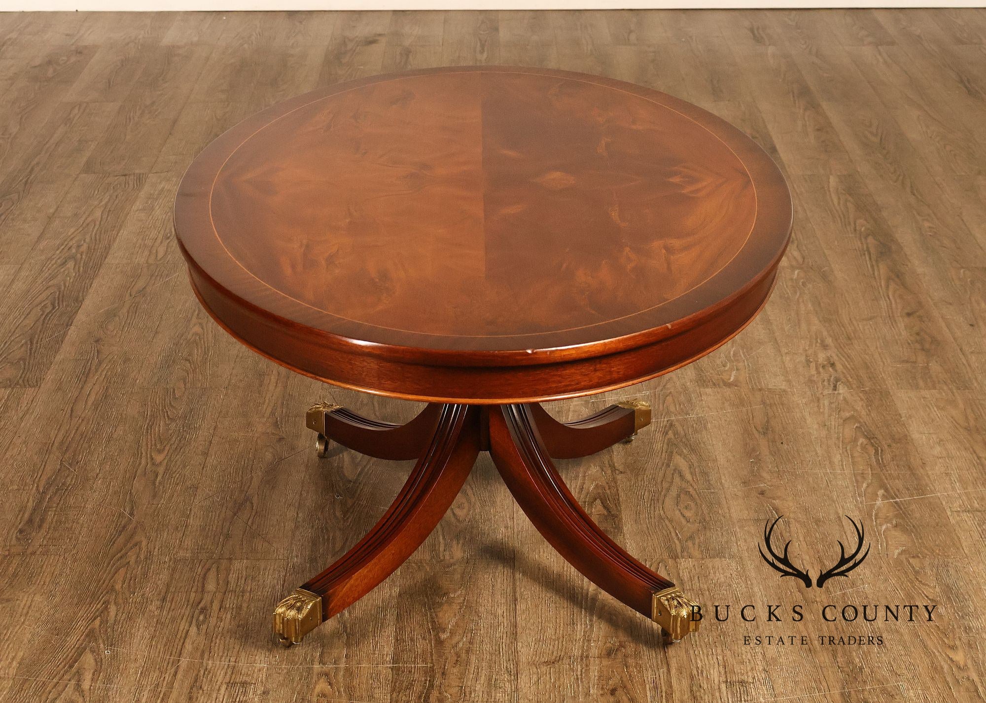 Regency Style Flame Mahogany Oval Top Coffee Table