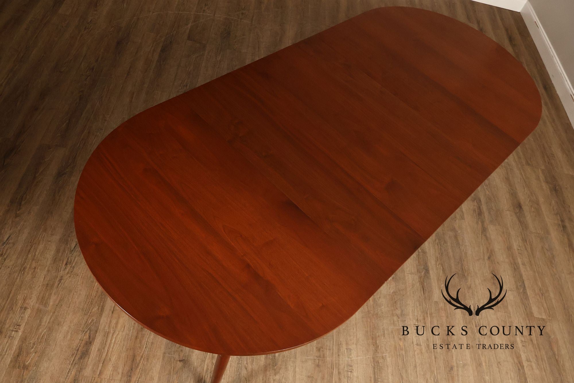 E. A. Clore Custom Walnut Extendable Dining Table With Four Leaves