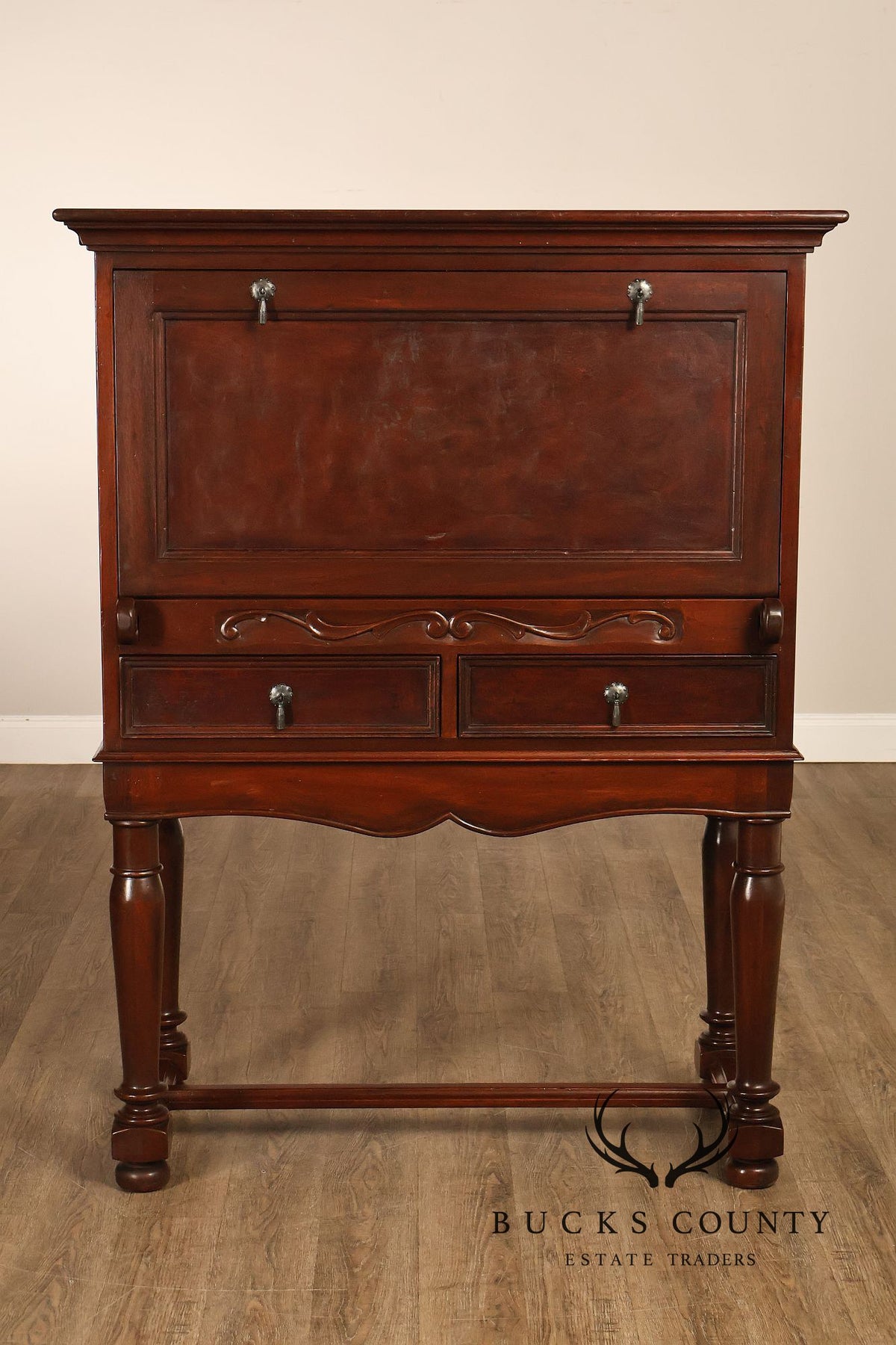 Traditional English Style Drop Front Bar Cabinet With A Stretcher Base