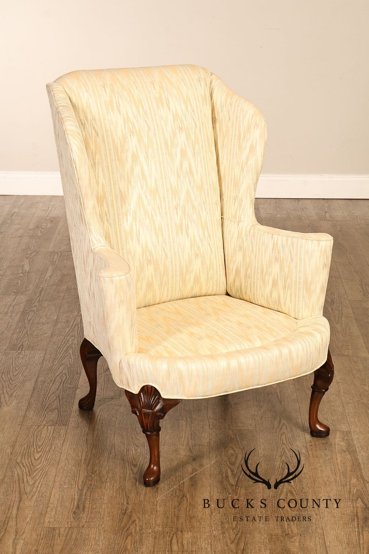 Traditional Upholstered Pair Of Wingback Armchairs With Carved Cabriole Legs