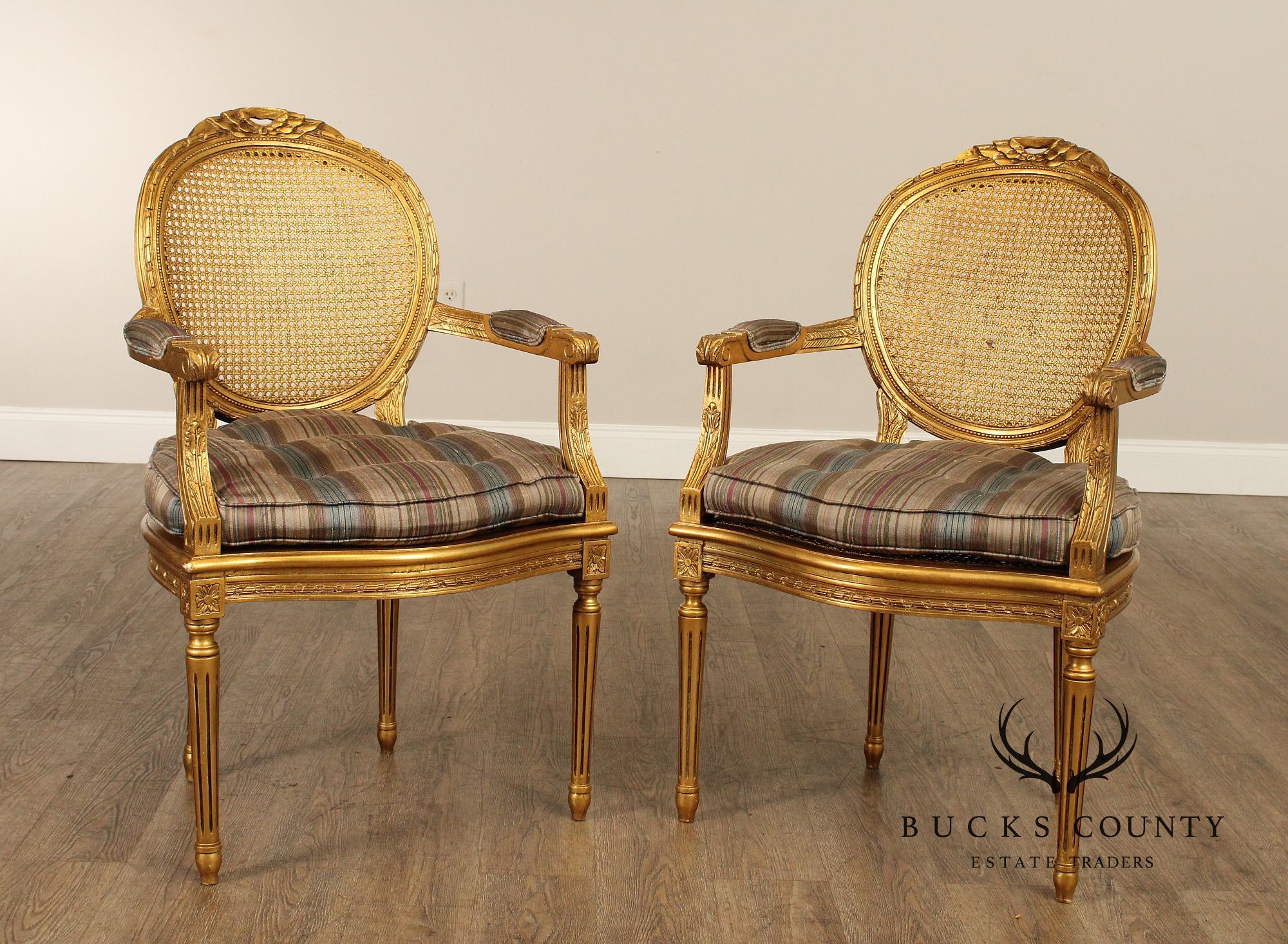 Decorative Crafts, Inc. Pair of French Louis XVI Style Caned Giltwood Fauteuil Armchairs