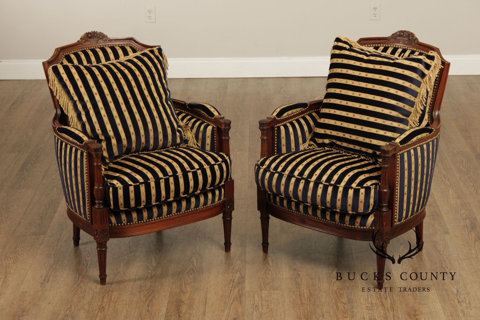 French Louis XVI Style Pair of Carved Walnut Bergere Armchairs