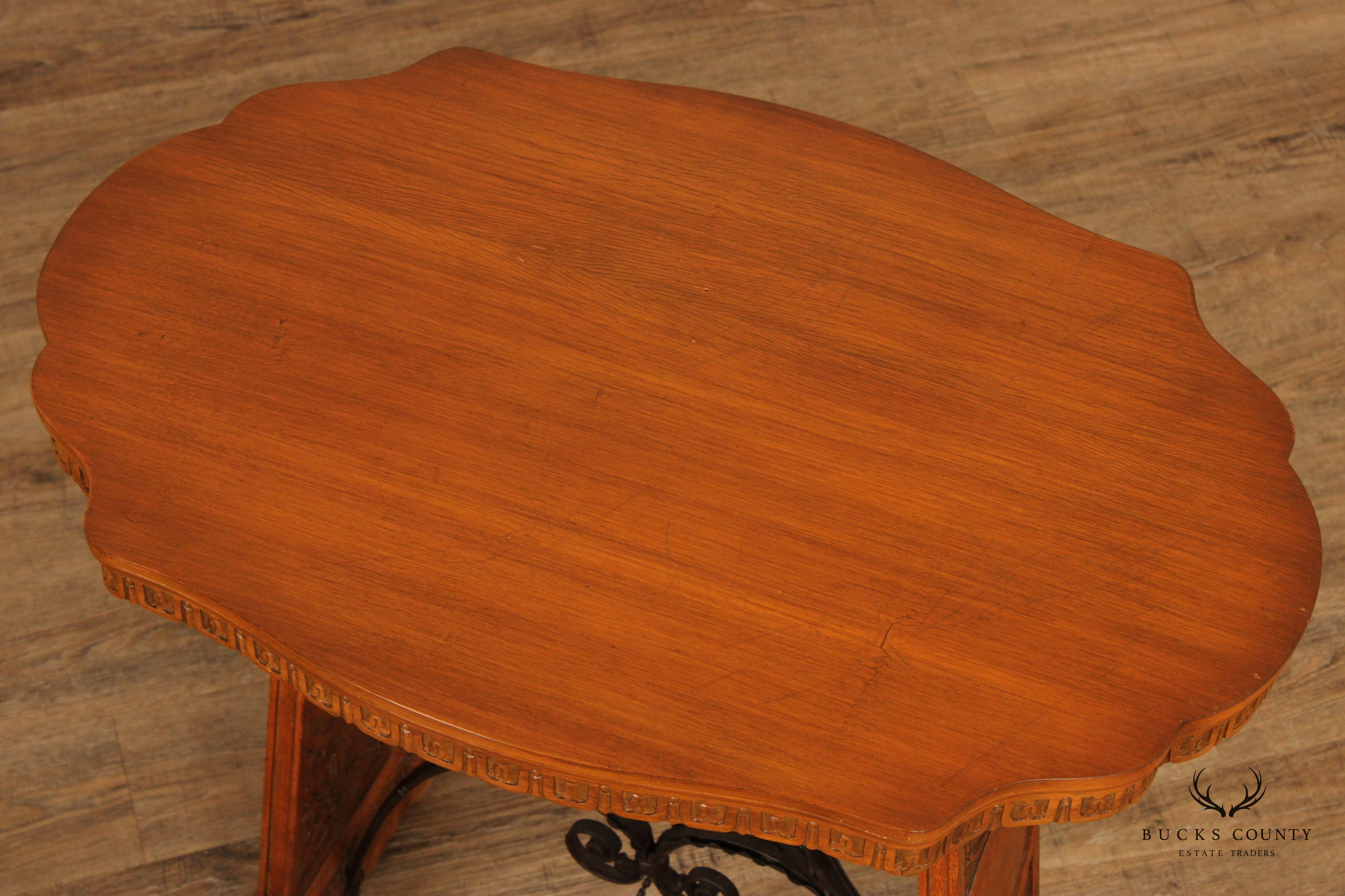 Antique Spanish Revival Carved Oak And Forged Iron Trestle Side Table