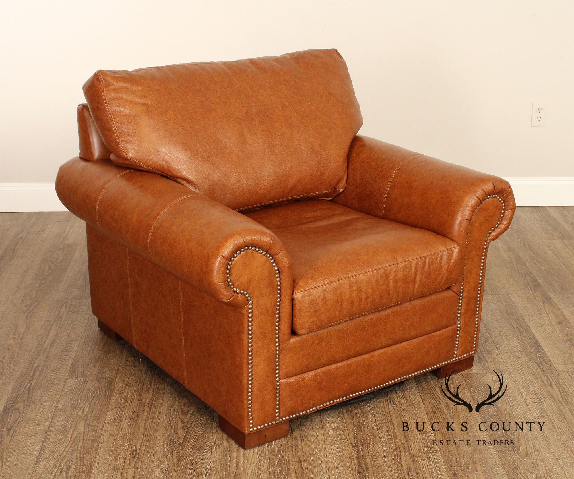 Leather Upholstered Chair & Ottoman