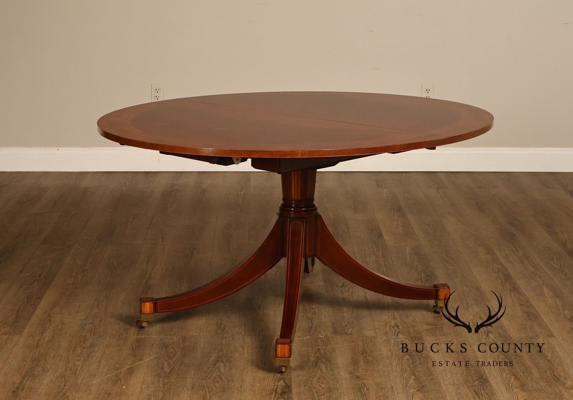 Baker Regency Style Banded Mahogany Extendable Dining Table