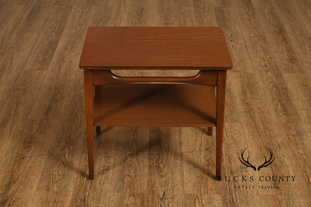 Mid-Century Modern Walnut Two-Tier End Table With Sculpted Apron Detail