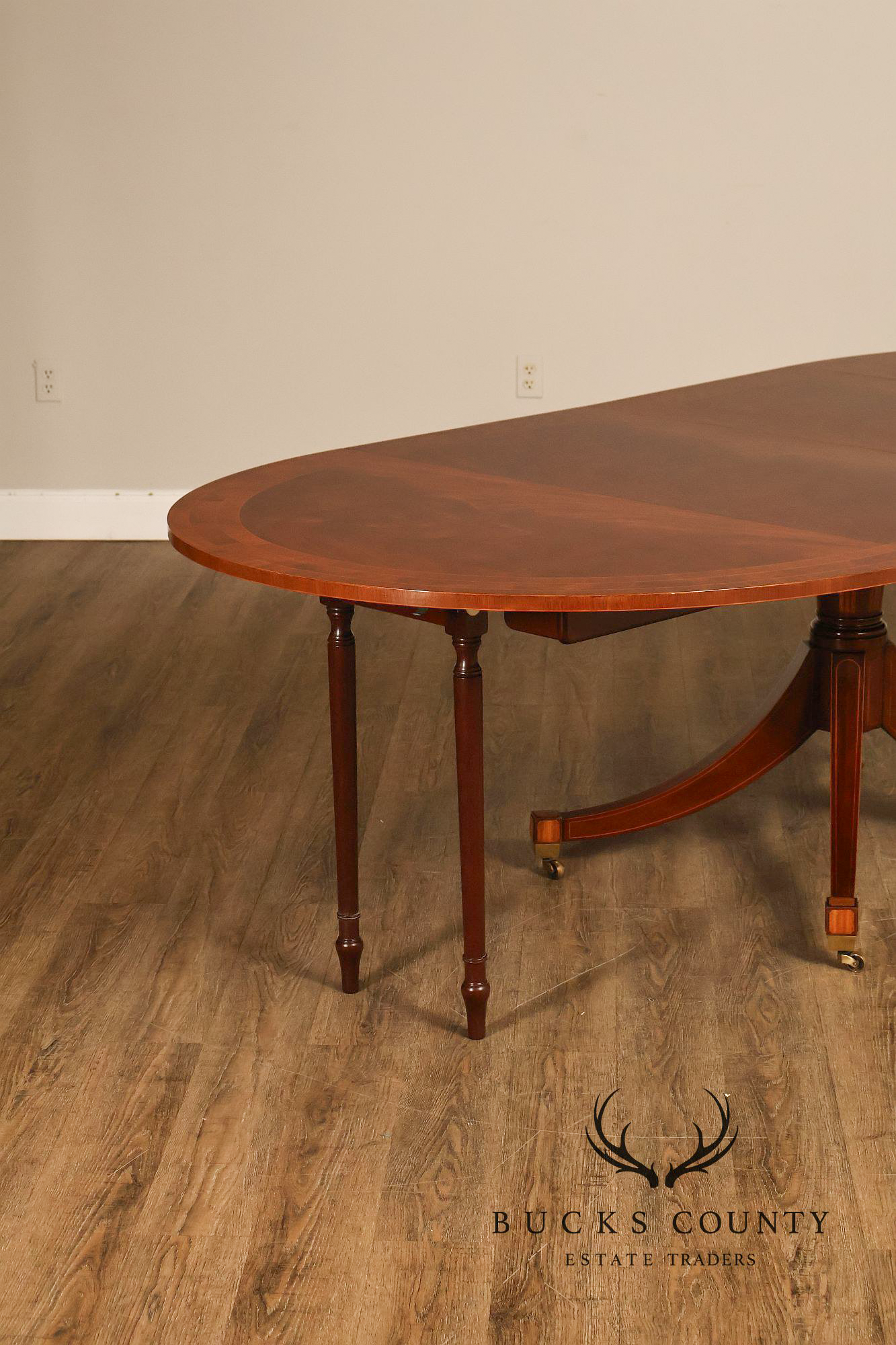 Baker Regency Style Banded Mahogany Extendable Dining Table