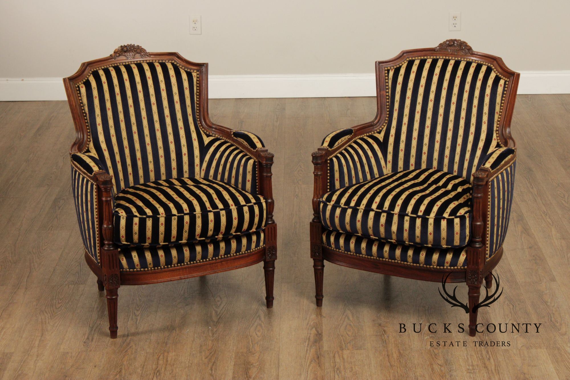 French Louis XVI Style Pair of Carved Walnut Bergere Armchairs