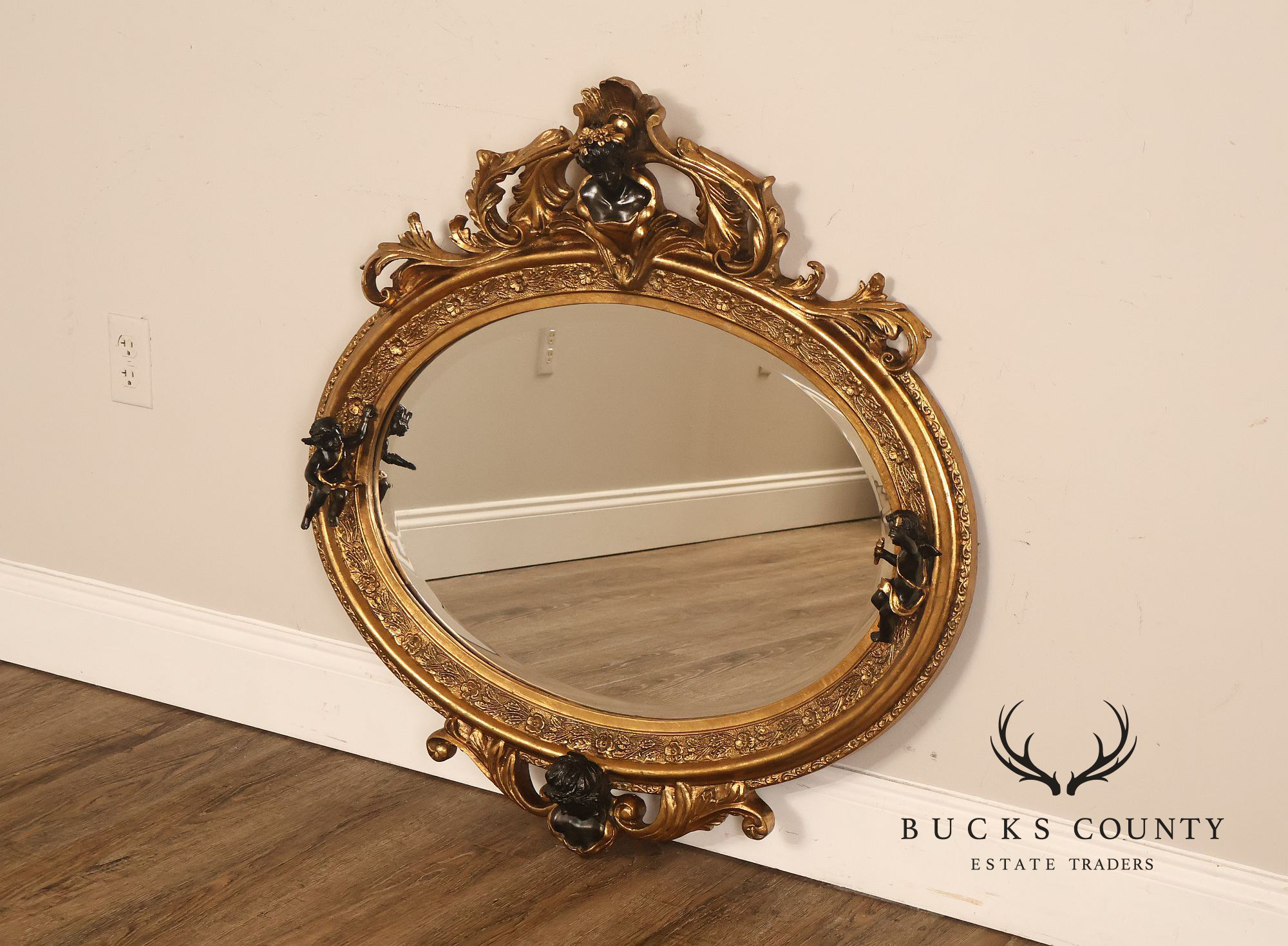 Italian Renaissance Style Cherub Mounted Oval Mirror