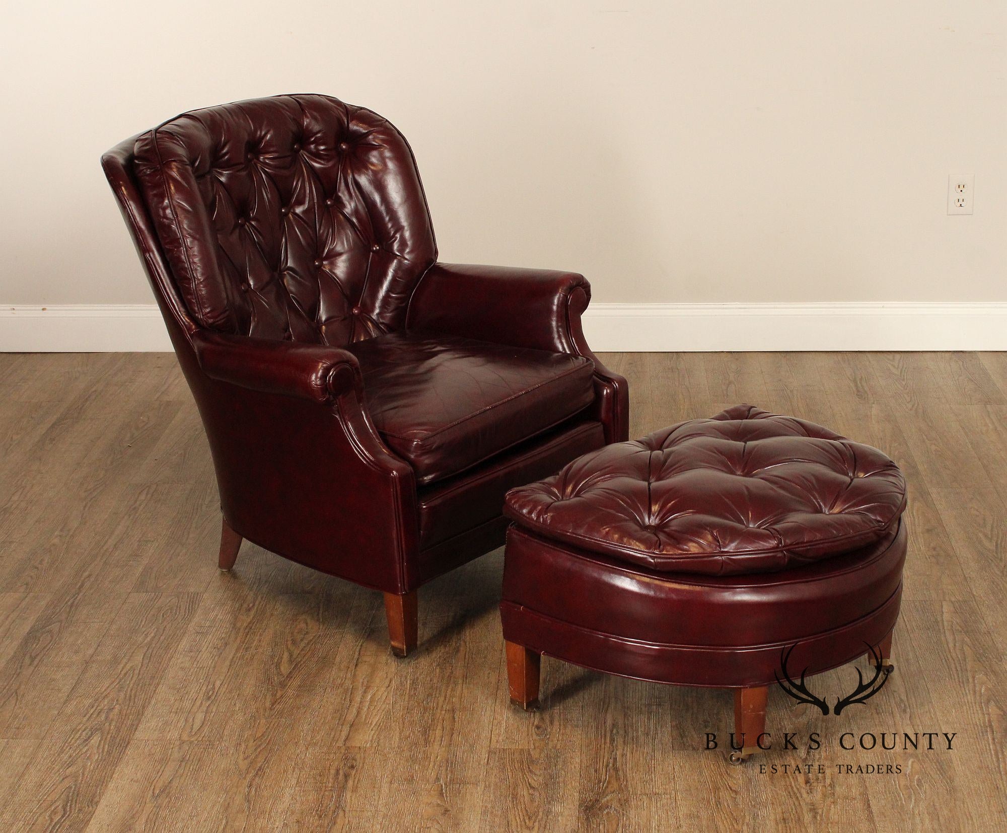 NORTH HICKORY OXBLOOD TUFTED LEATHER CHAIR AND OTTOMAN