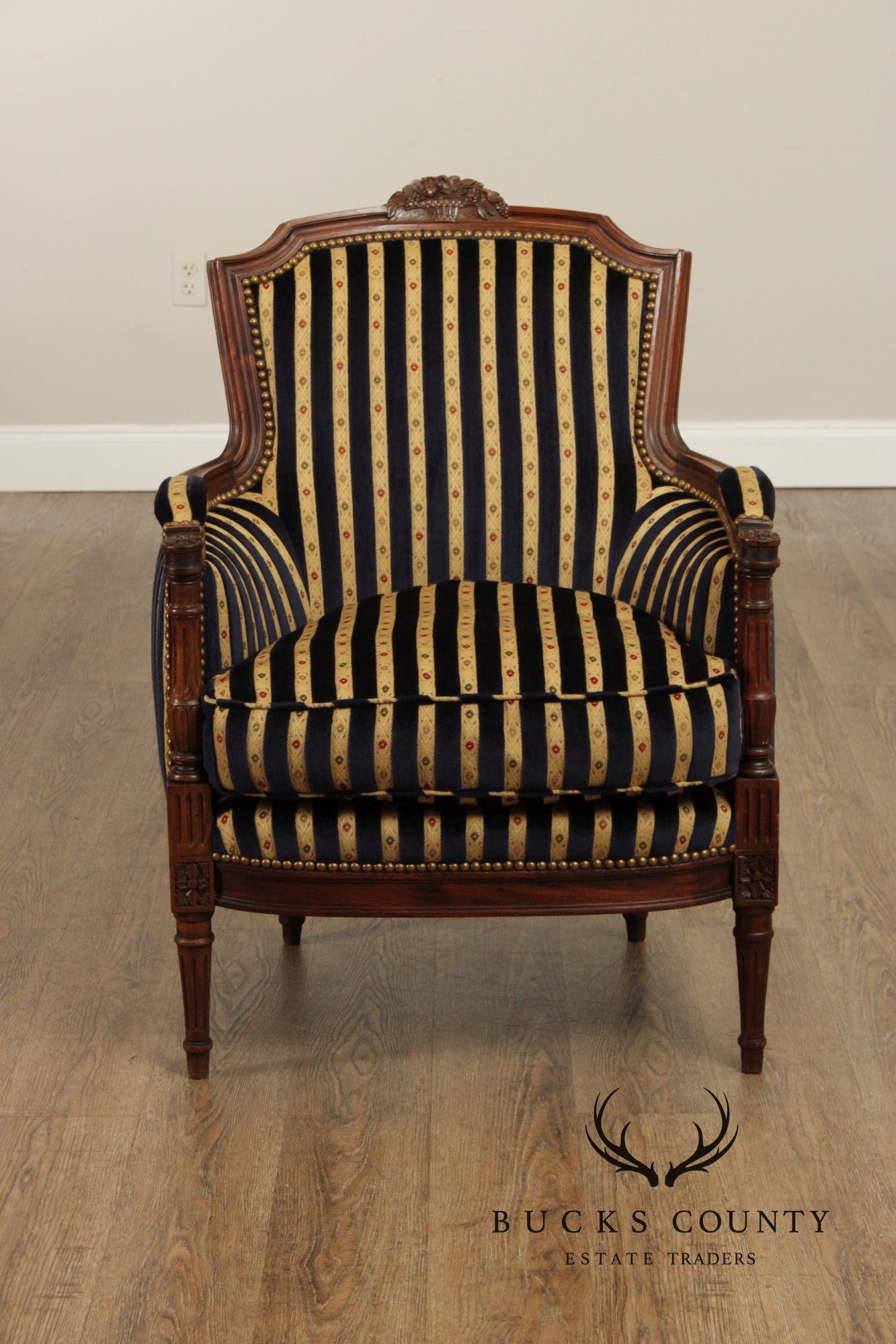 French Louis XVI Style Pair of Carved Walnut Bergere Armchairs