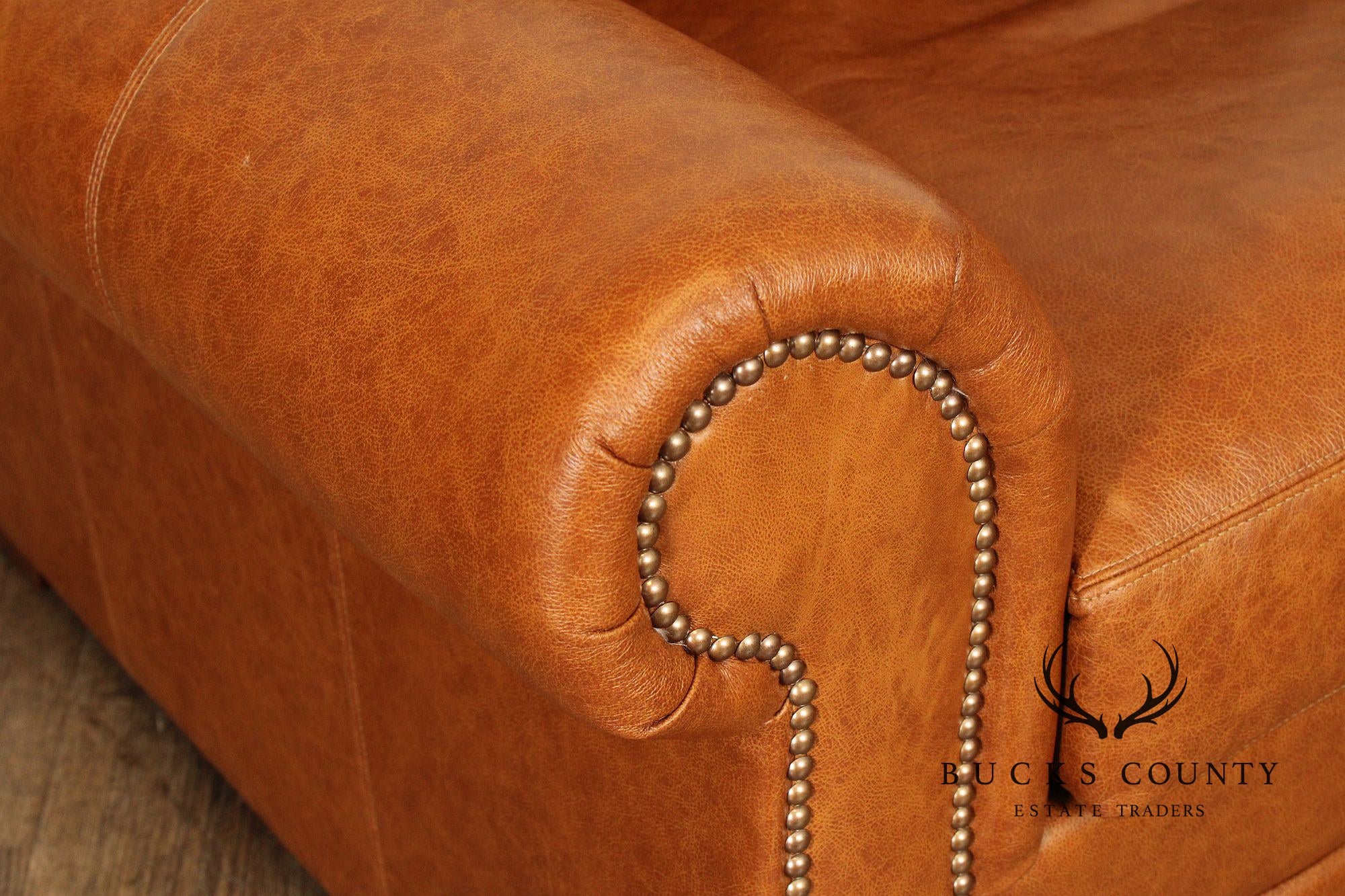 Leather Upholstered Chair & Ottoman